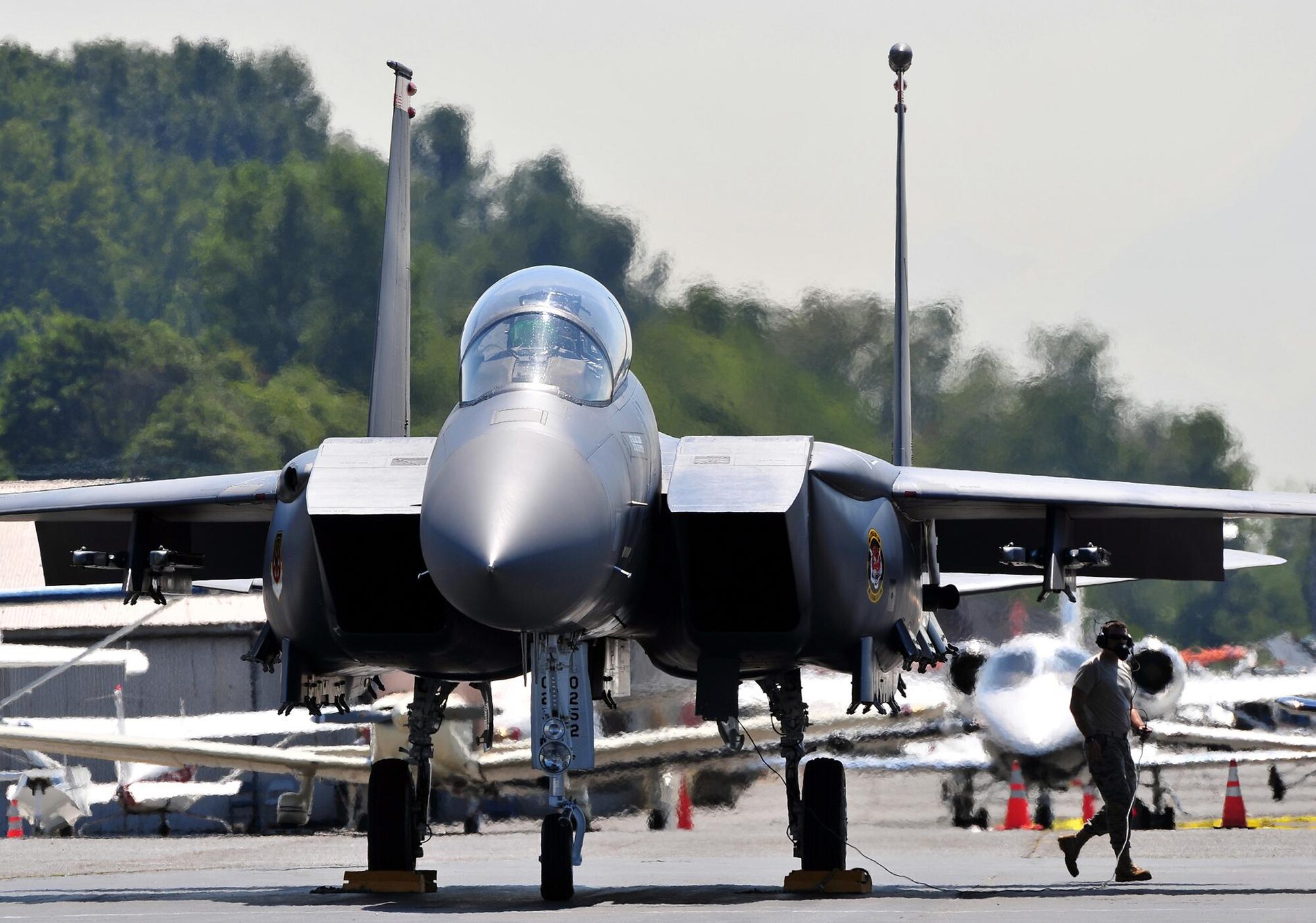 SEATTLE – A crew chief from the 391st Aircraft Maintenance Unit finishes checking an F-15E Strike Eagle from the 391st Fighter Squadron before it performs at the Seafair Hydroplane Races and Air Show in Seattle July 30 through Aug. 2. The 391st FS returned to perform during the air show for the first time in three years. The air show, hydro racing and beautiful setting along Lake Washington have made the event a perennial summer favorite since the 1950s. (Photo courtesy Long Bach Nguyen)