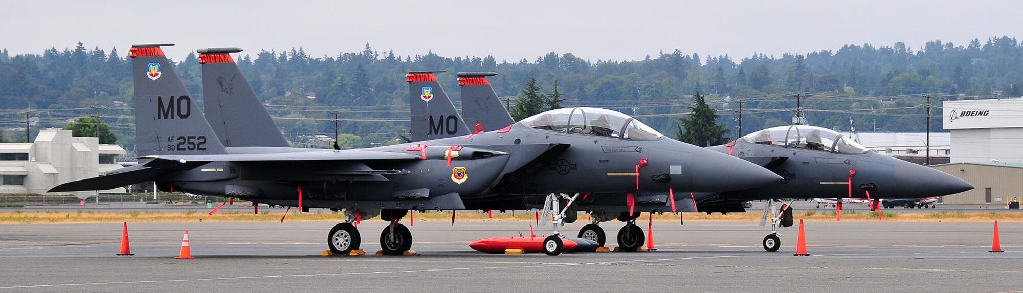 SEATTLE - Two F-15E Strike Eagles from the 391st Fighter Squadron sit on the flightline of Boeing Field in Seattle while waiting to perform during the Seafair Hydroplane Races and Air Show in Seattle July 30 through Aug. 2. The 391st FS returned to perform during the air show for the first time in three years. The air show, hydro racing and beautiful setting along Lake Washington have made the event a perennial summer favorite since the 1950s. (Photo courtesy Long Bach Nguyen)