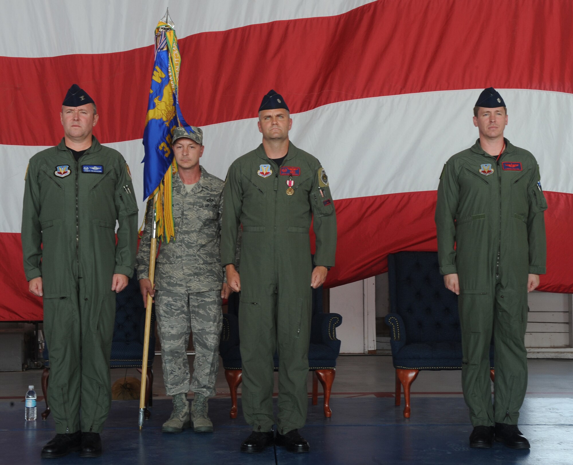 MOUNTAIN HOME AIR FORCE BASE, Idaho - (left to right) Col. James McGovern, 366th Operations Group commander, Lt. Col. Michael Koscheski and Lt. Col. Lamar Pettus prepare for the 389th Fighter Squadron change-of-command ceremony held at Hangar 201 Aug. 12. Colonel Pettus assumed command of the 389th FS from Colonel Koscheski during the ceremony. (U.S. Air Force photo by Airman 1st Class Renishia Richardson)