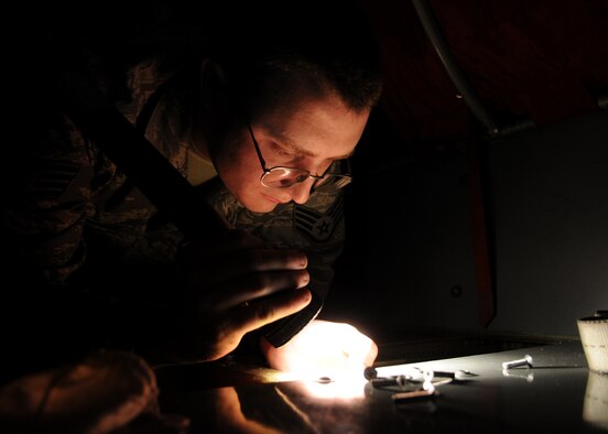 RAF MILDENHALL, England – Staff Sgt. Jonathan Laurence, 100th Maintenance Squadron jet engine mechanic, repairs a nut plate during the ISO inspection on a KC-135 Aug. 13, 2009. Sergeant Laurence repairs many minor deficiencies as a small part of the overall ISO inspection, an inspection that ensures aircraft reliability and mission support readiness. (U.S. Air Force photo by Staff Sgt. Jerry Fleshman)