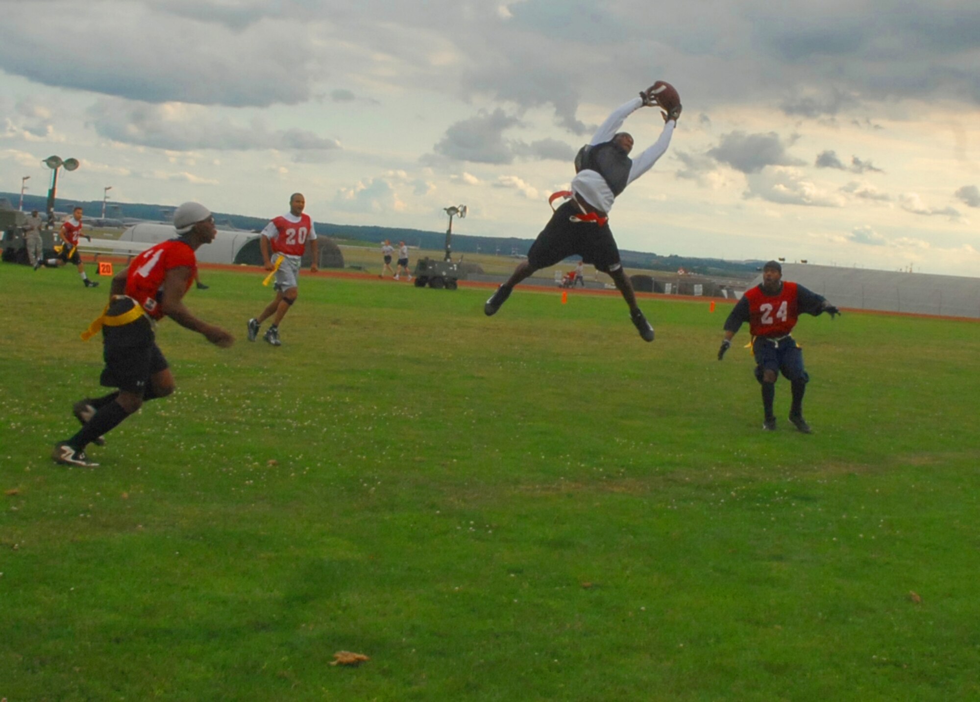 SPANGDAHLEM AIR BASE, Germany -- Maurice Hardy, 52nd Communications Squadron, catches the ball during a pre-season flag-football game Aug 4. The Comm. Squadron played against the Civil Engineering Squadron during a pre-season tournament held on the field behind the fitness center. The flag football regular season began Aug. 24 and runs until Oct. 14. (U.S. Air Force photo/Airman 1st Class Nick Wilson)