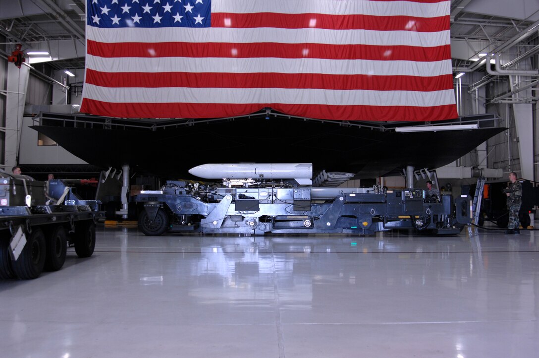 WHITEMAN AIR FORCE BASE, Mo. – The Weapons Load Trainer, built by Lockheed and Hughs in 1993 for Whiteman AFB, is a full scale B-2 weapons loading trainer used for training and certifying load crews. It uses two functional weapons bay and interfaces with actual rotary launcher assemblies, smart bomb rack assemblies and munitions lift trailer. The WLT is 67 feet long, 48 feet wide and 18 feet high weighing in at 80,000 pounds. (U.S. Air Force photo/Staff Sgt. Jason Barebo)