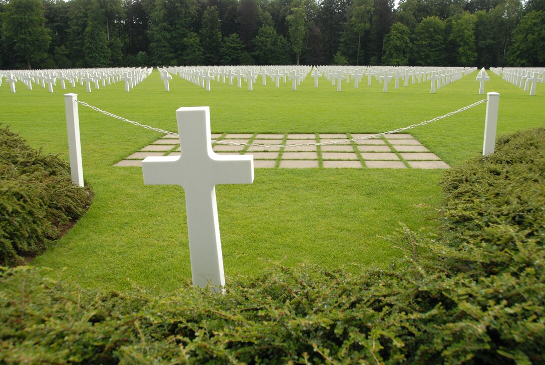 The final resting place of General George S. Patton, located in the Luxembourg American Cemetery and Memorial in Hamm,Luxembourg, overlooks the grave sites of many of the men he commanded during the Battle of the Bulge in World War II.  (Air National Guard Photo by Tech Sgt Kendra Owenby)
