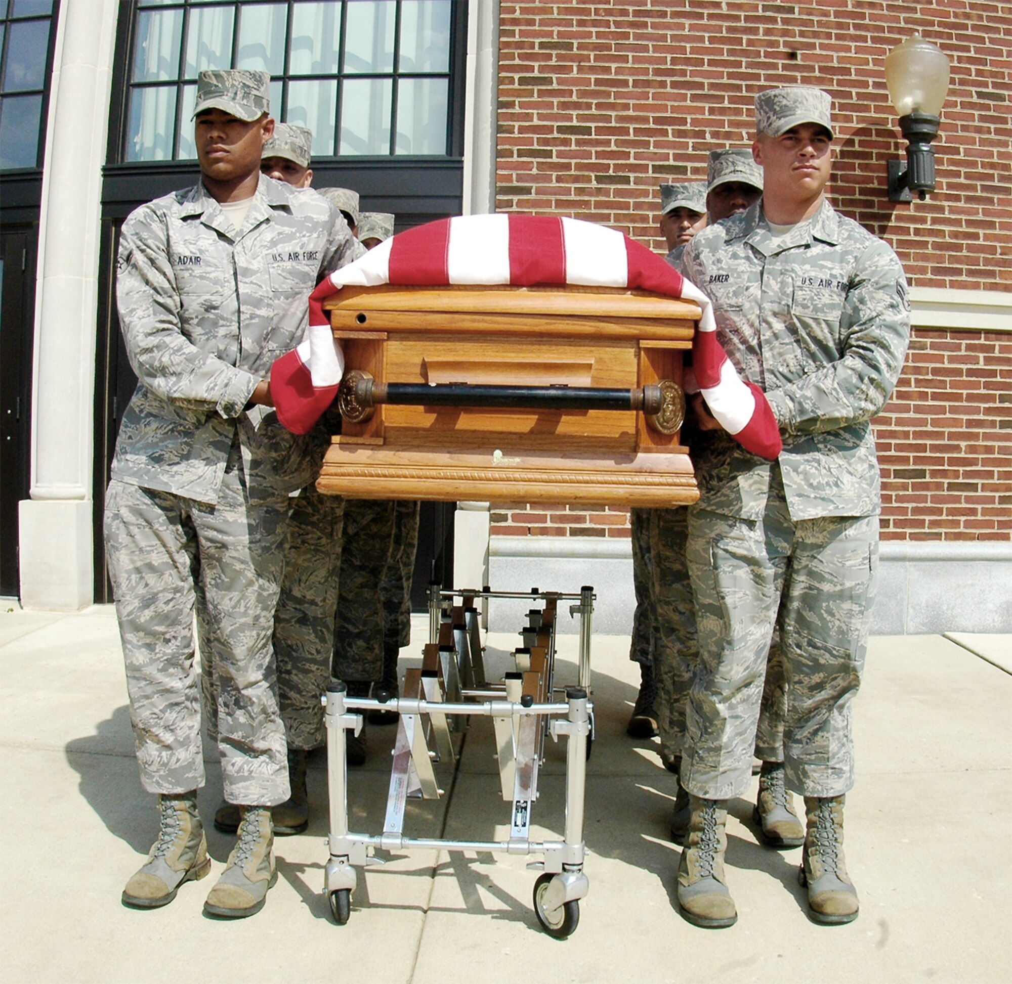 United States Honor Guard body bearers train with a weighted casket to prepare for funereal duties performed every day. Difficulties faced in training prepare the bearers for the difficulties they will face on the job. As part of the Honor Guard, body bearers represent the United States Air Force and go through a stringent screening process to ensure qualifications for the special duty. (U.S. Air Force photo/Airman 1st Class Katherine Windish) 