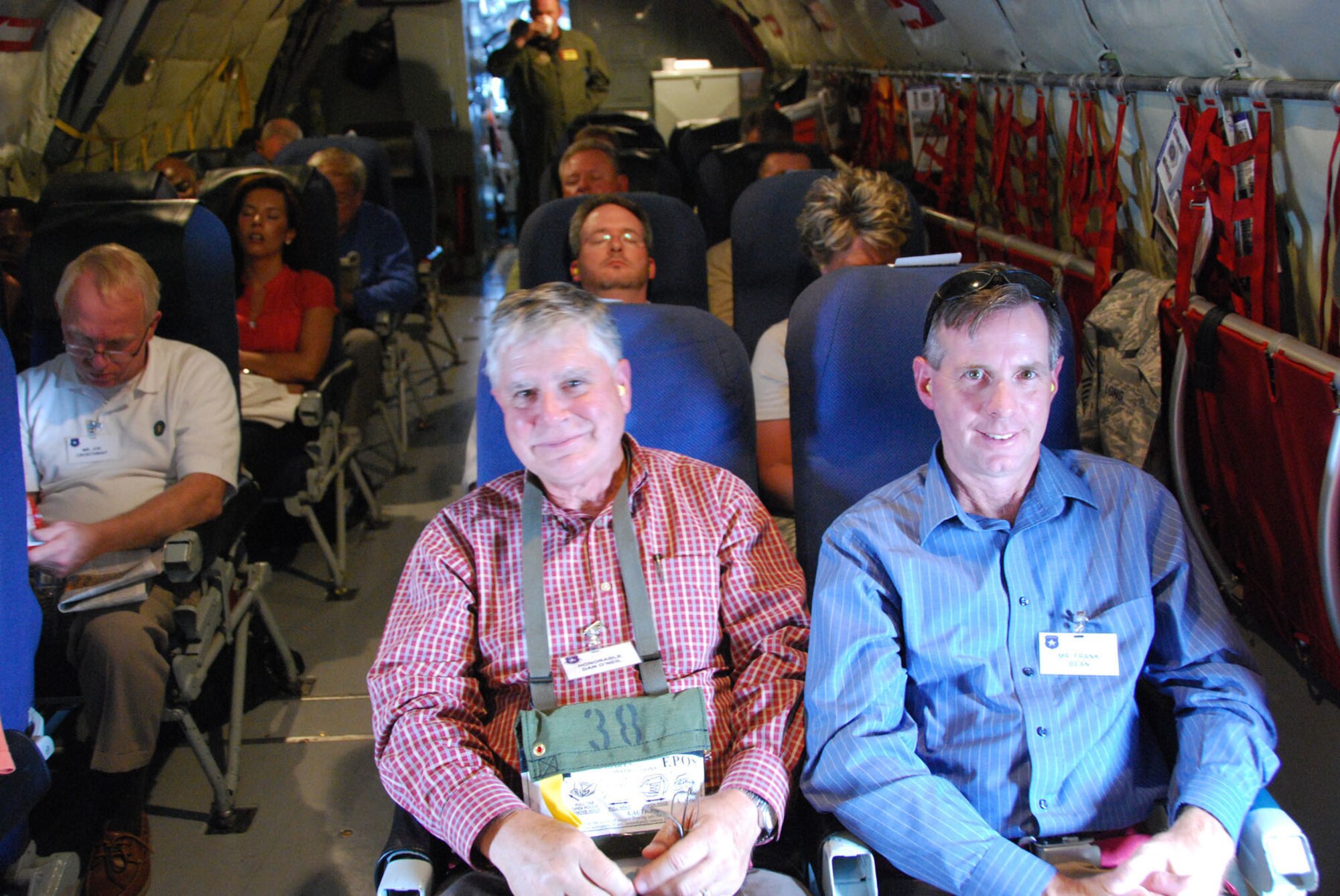 Honorable Dan O'Neal, Mayor of Edmond, Oklahoma and Frank Bean, right, President of the Choctaw, Oklahoma Chamber of Commerce are enjoying their flight aboard a KC-135 Stratotanker.  The two were part of a Team Tinker Civic Leader flight held August 13-14 hosted by the 507th Air Refueling Wing and Tinker Air Force Base.