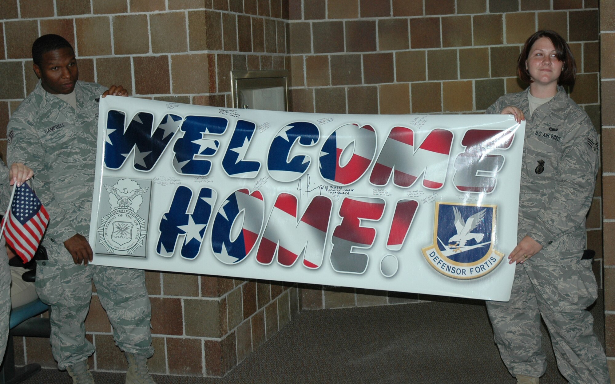 Thirteen Airmen from the 315th Airlift Wing’s Security Forces Squadron, Charleston Air Force Base, S.C., returned to Charleston yesterday after more than six months in Iraq. The Air Force Reserve security forces members were deployed to Kirkuk Air Base, Iraq, since February and were responsible for base defense. Their duties included police services, perimeter patrol, entry control, flight-line security, on-base investigations and searches of all vehicles and personnel entering the installation. (U.S. Air Force photo / Tony Clark)