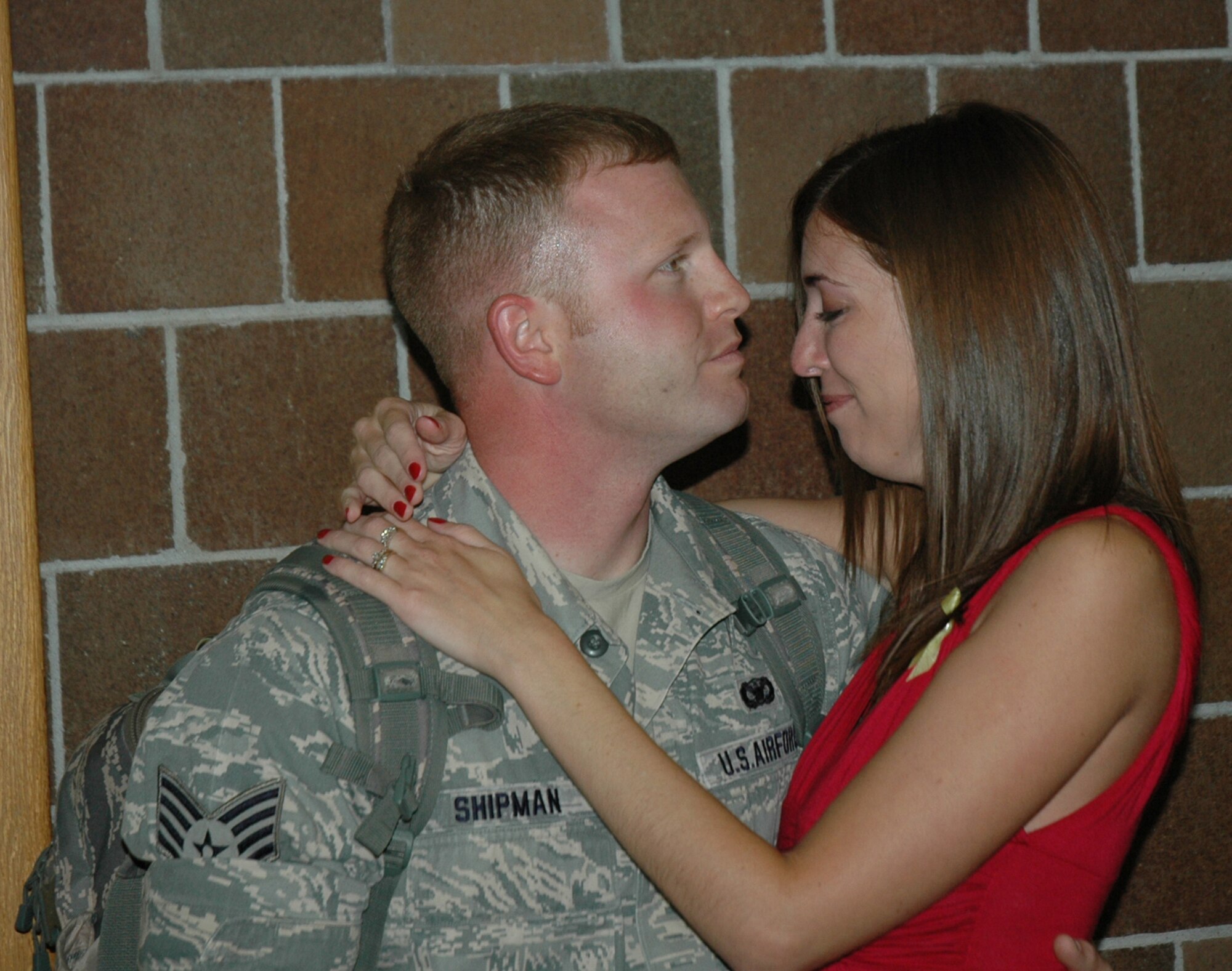 Thirteen Airmen from the 315th Airlift Wing’s Security Forces Squadron, Charleston Air Force Base, S.C., returned to Charleston yesterday after more than six months in Iraq. The Air Force Reserve security forces members were deployed to Kirkuk Air Base, Iraq, since February and were responsible for base defense. Their duties included police services, perimeter patrol, entry control, flight-line security, on-base investigations and searches of all vehicles and personnel entering the installation. (U.S. Air Force photo / Tony Clark)