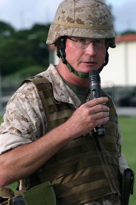 U.S. Marine Brig. Gen. James Laster speaks during the 3D Marine Division Change of Command Ceremony, on Camp Hansen, Okinawa, Japan, Aug. 20, 2009.  A change of command ceremony is a formal change over of duties from one commanding officer to another in the presence of the unit.  (U.S. Marine Corps photo by Cpl. John A. Chretien/Not Released)