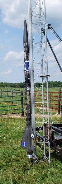 The Air Force Office of Scientific Research and NASA successfully test launched the first-ever rocket powered with environmentally friendly Aluminum-Ice Propellant August 7 near Purdue University. The ALICE flight-vehicle pictured here assembled on its launch rail, consists of an all-carbon-fiber, minimum diameter high-power rocketry kit. (Credit: Dr. Steven F. Son, Purdue University)  
