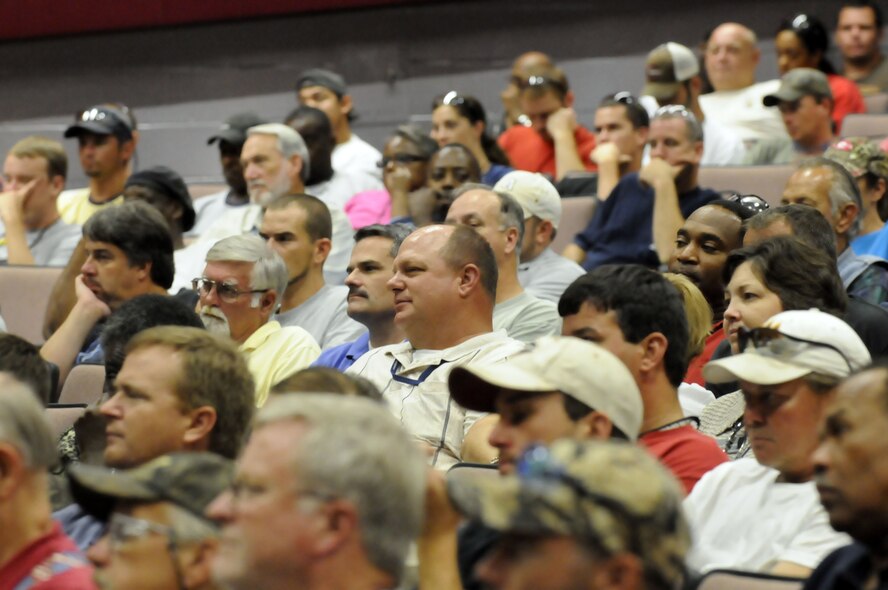 Members of the 402nd Maintenance Wing listen to Jeff Bell, motivational safety and VPP speaker, Aug. 19 at the base theater. Mr. Bell's presentation, "Brian's Story," tells the true story of a preventable industrial accident that claimed the life of his son Brian. U. S. Air Force photo by Sue Sapp