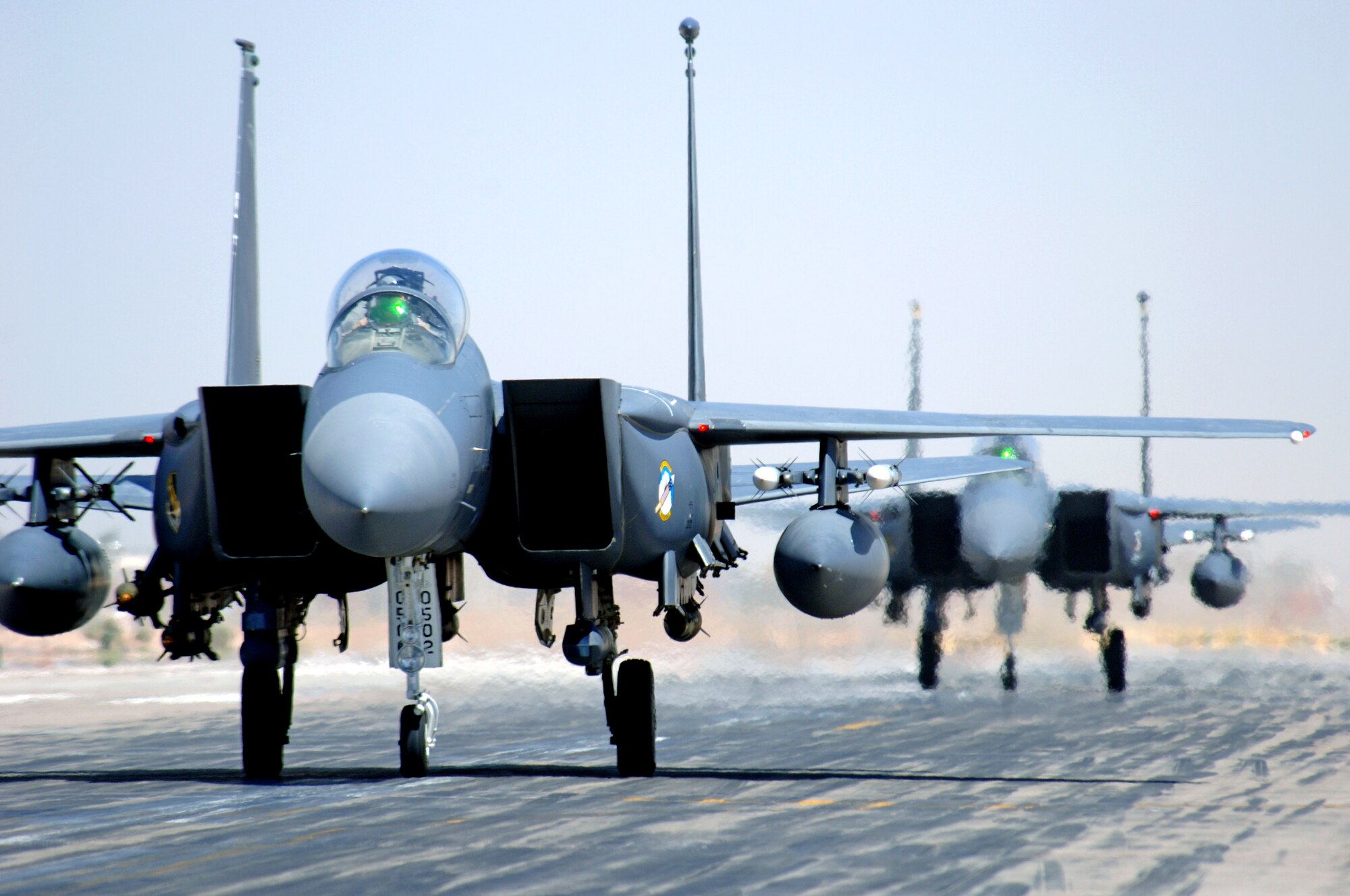 F-15E Strike Eagles taxi in at Joint Base Balad, Iraq, after an Operation Iraqi Freedom mission. The F-15E is a dual-role fighter designed to perform air-to-air and air-to-ground missions as well as provide armed aerial overwatch. The fighters are deployed from Seymour Johnson Air Force Base, N.C. (U.S. Air Force photo/Staff Sgt. Tony R. Tolley)