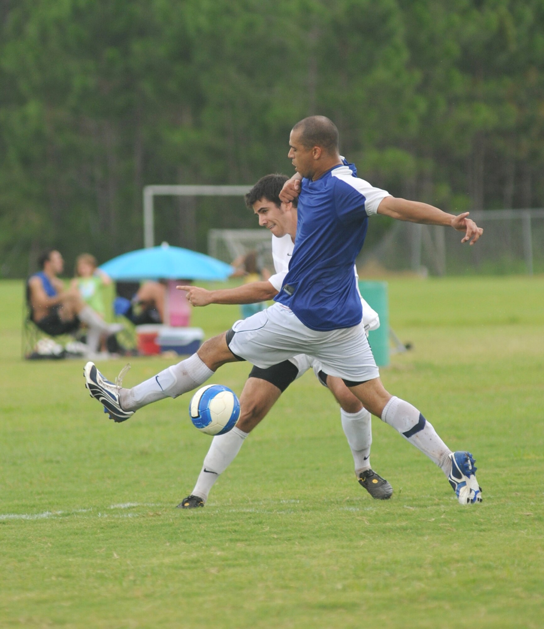 Damian Bluett, foreground, 81st Medical Support Squadron, battles Sam Prudhomme during an area soccer tournament in Gau-tier, Miss., Saturday.  Prud-homme played for Green Death from Baton Rouge, La., the second place team out of the five that participated.  Team Suspect won the event.  Keesler’s varsity squad fielded two teams that placed third (1-2) and fourth (1-3). Injured Reserves were in last place (0-3).  (U.S. Air Force photo by Kemberly Groue)