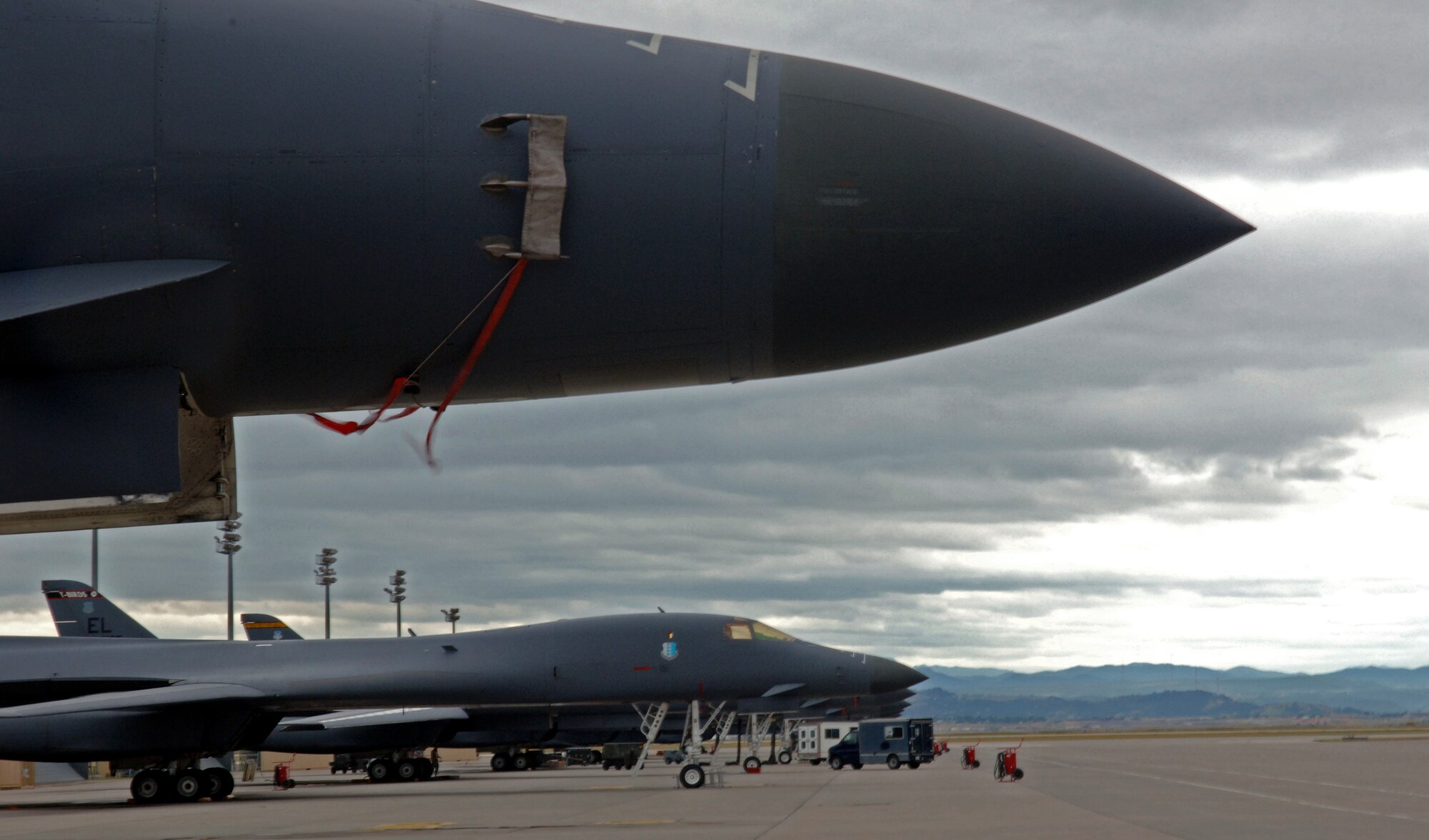 B-1B Lancers sit lined up on the flightline here, August 19. The B-1 can rapidly deliver massive quantities of precision and non-precision weapons against any adversary, anywhere in the world. (U.S. Air Force photo/ Airman 1st Class Jarad A. Denton)