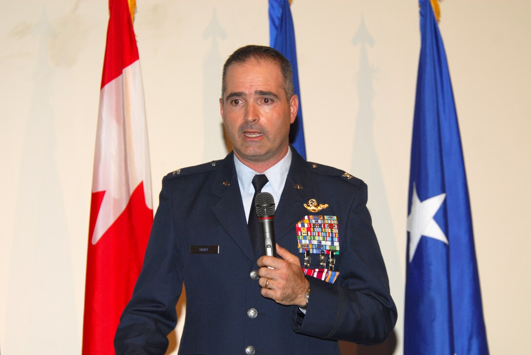 Col. George Uribe,  1st Air Force chief of Standardization and Evaluation, addresses his family and friends in attendance at his promotion ceremony.  Col. Uribe was promoted to colonel and also presented with the Bronze Star Medal, the Meritorious Service Medal, and his fourteenth Air Medal. (U.S Air Force photo by Lisa Norman)  