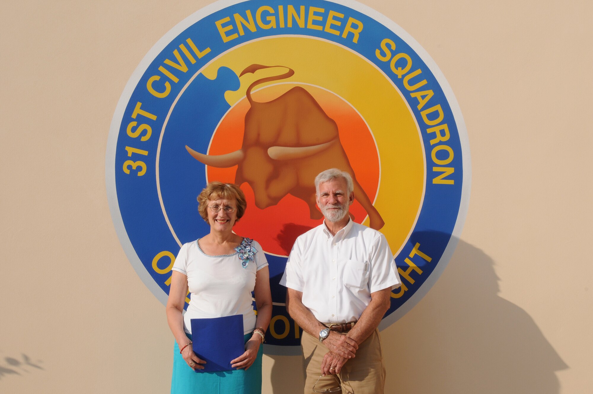 Mariagrazia De Pol and Bill Nettelmann, both from the 31st Civil Engineer Squadron, are the most recent Aviano's Finest selectees for Aug. 21, 2009. Signorina De Pol was recognized in the Italian civilian category, while Mr. Nettelmann was recognized in the U.S. civilian category. Tech. Sgt. Jason Balolong, who is not pictured, was recognized in the military category. (U.S. Air Force photo/Airman 1st Class Ashley Wood)