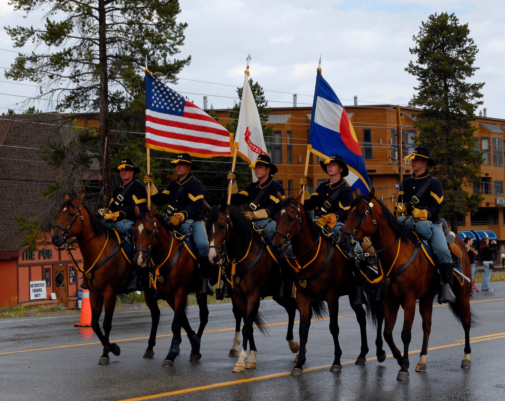 Soldiers from Fort Carson provide a mounted color guard for the Salute to American Veterans Rally and Festival parade in Winter Park, Colo., Aug. 15. (U.S. Air Force photo by Senior Airman Stephen Musal)