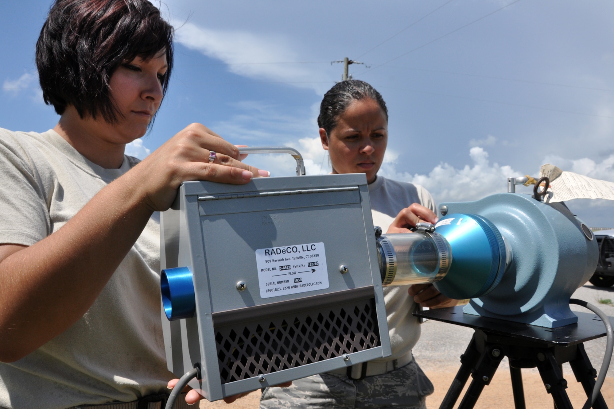 EGLIN AIR FORCE BASE, Fla. – Staff Sgt. Maribel Alvarado and Airman 1st Class Sara Schuster, 96th Aero Medical Squadron check for background radiation at a simulated crash site during a nuclear accident response exercise here, Aug. 18. The NARE put Eglin’s readiness to the test after a simulated C-17 Globemaster declared an in-flight-emergency and subsequently crashed with 10 people and a special weapon on board. These exercises maintain readiness for Eglin’s emergency responders, follow-on forces and maintain qualifications of command and control personnel. During the exercise, agencies had the opportunity to work with other Eglin units they don’t train with regularly. (U.S. Air Force photo/ Airman Anthony Jennings)