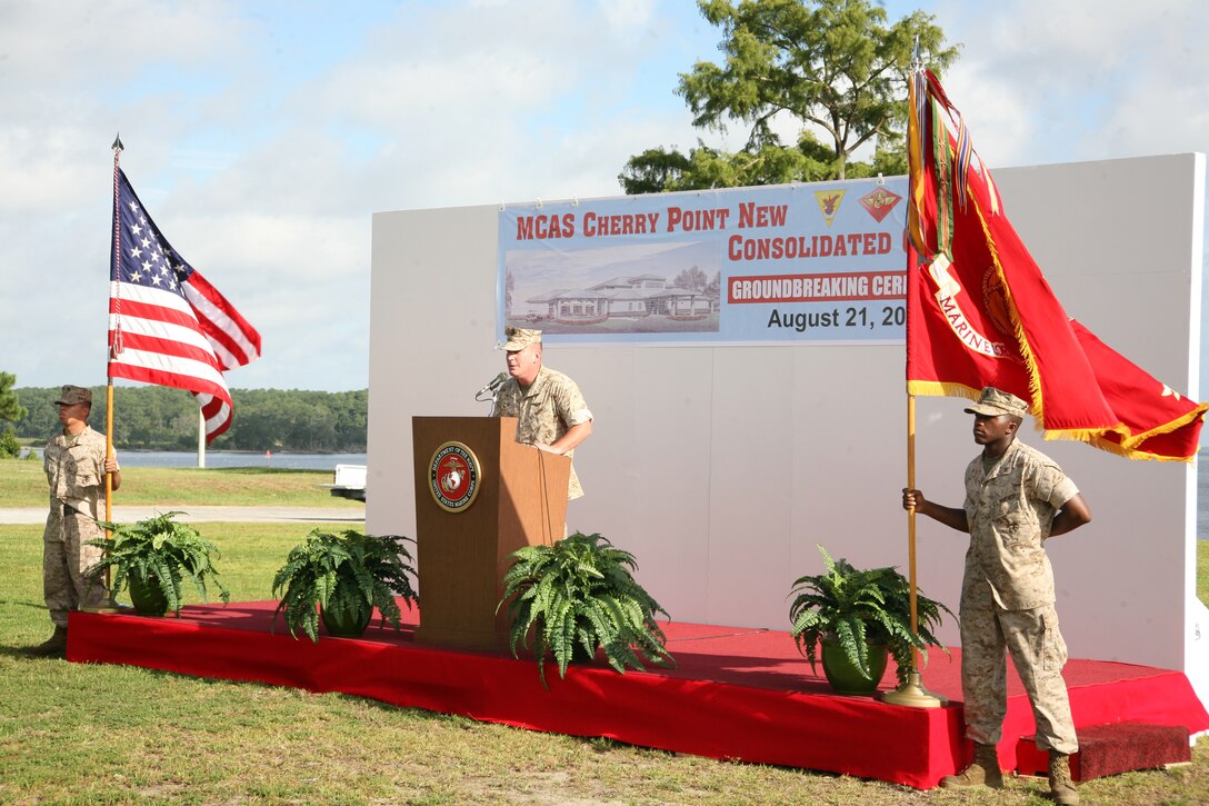 Col. Douglas A. Denn, commanding officer of MCAS Cherry Point, speaks about the new Staff NCO and Officer Consolidated Club. The club will have a ballroom, two lounges, a family style restaurant and patio seating facing the Neuse River.