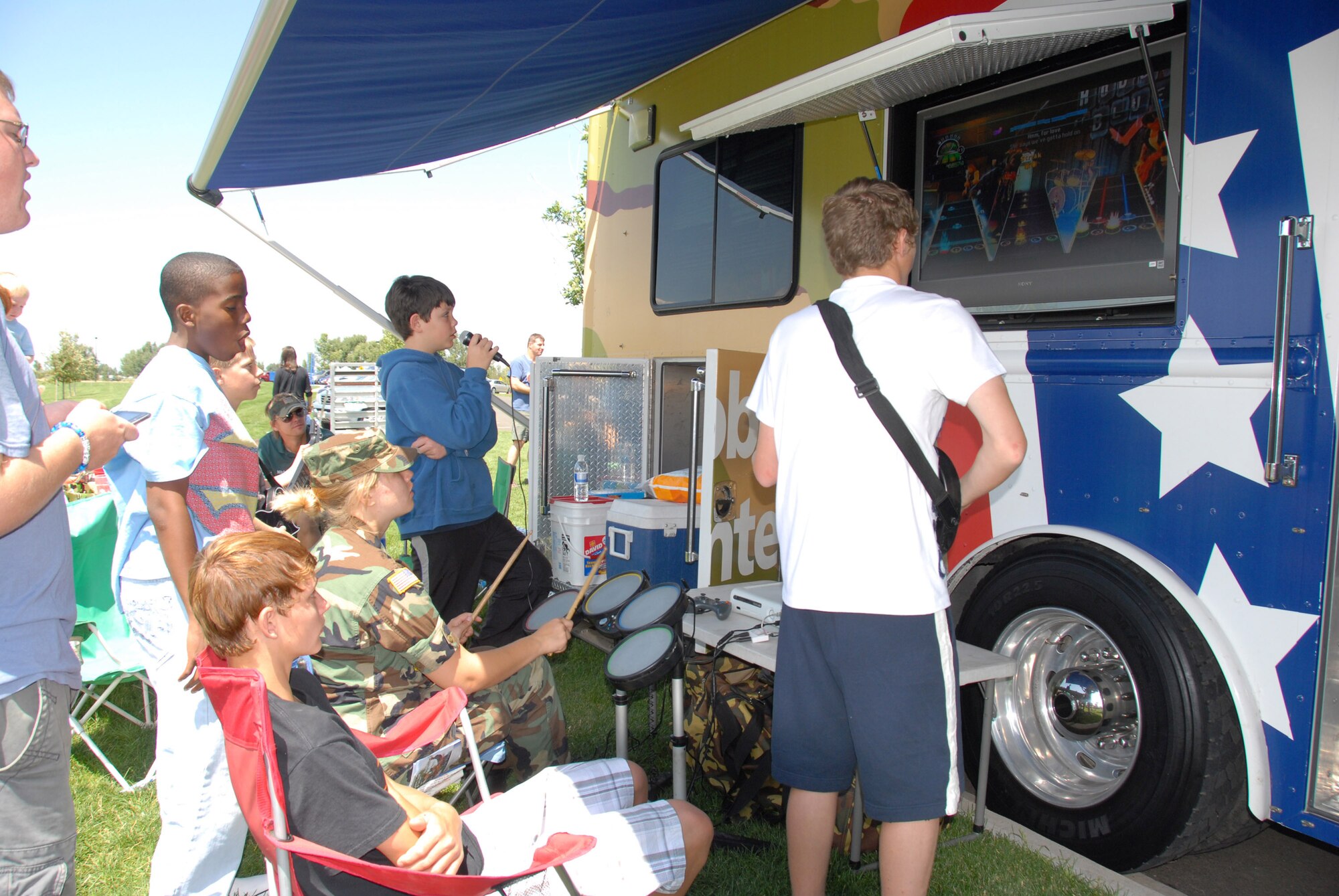 Children of 140th Wing, Colorado Air National Guardsmen play rock band at the Welcome Home picnic on August 16, 2009.  More than 3000 wing members, employers and community supporters celebrated the return of more than 250 Airmen from Iraq.