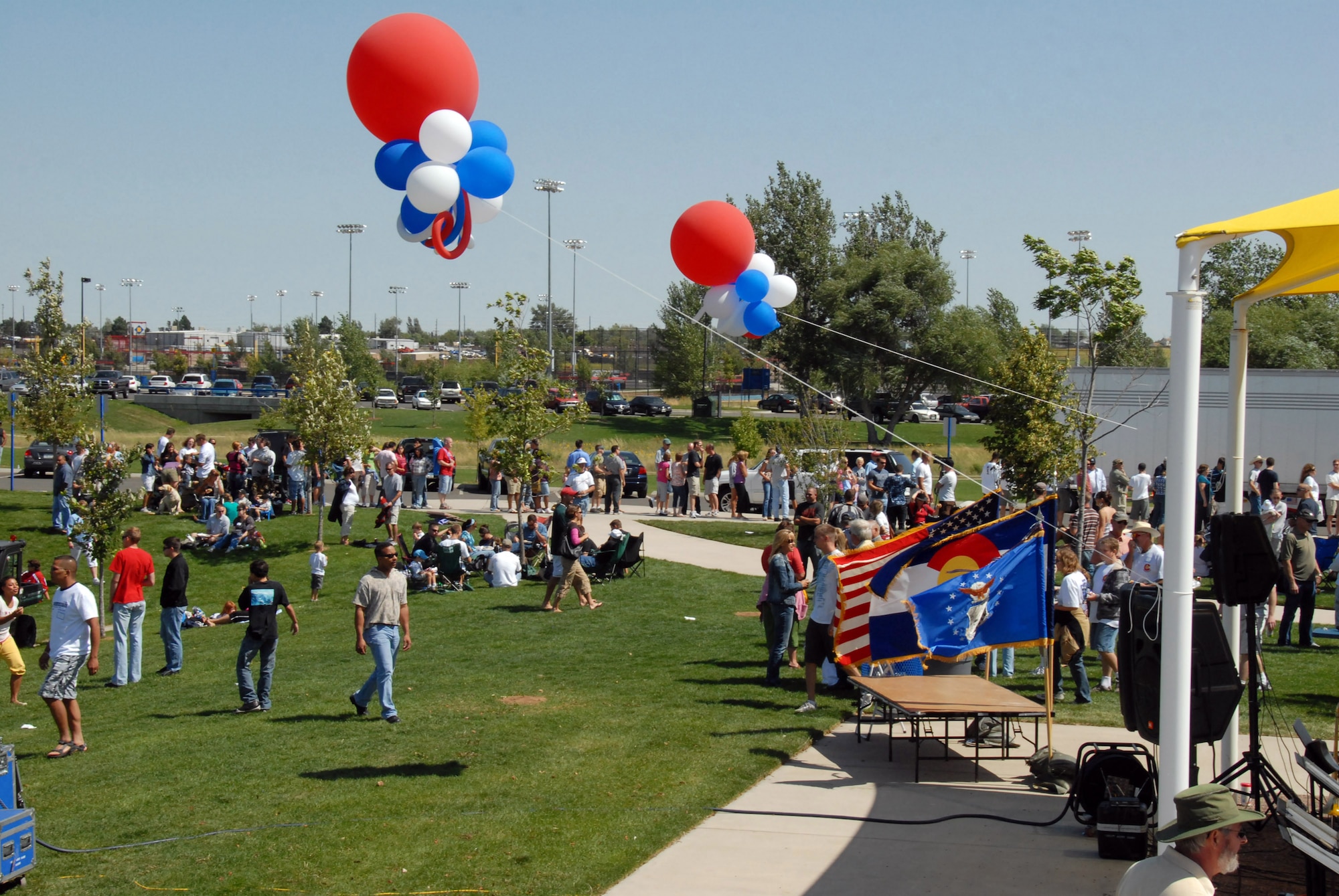 Flags fly on a breezy but warm summer day during the Colorado Air National Guard's Welcome Home Ceremony on the 16th of August, 2009.