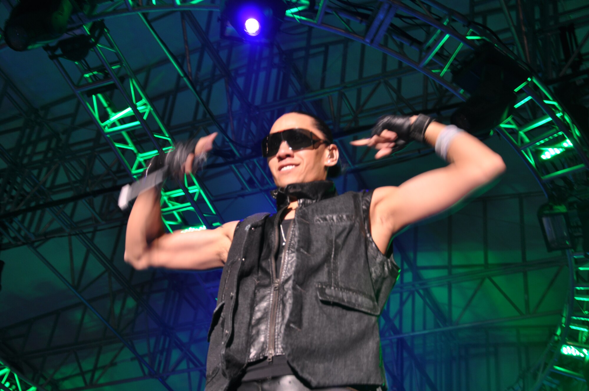 MARINE CORPS BASE, Hawaii -- The Black Eyed Peas perform hit songs Aug. 15 during BayFest 2009 at Kaneohe Bay, Hawaii. The show, which attracted 15,000 Marines, Airmen, Soldiers, Sailors, Coastguardsmen, and local residents and tourists, was sold out three weeks prior. Lauded as "the biggest entertainment event in Hawaii," BayFest is an annual event featuring rides, games, fireworks, and live music organized by Marine Corps Community Services. Proceeds from this event enhance the quality of life for military servicemembers and their families. (U.S. Air Force photo/Staff Sgt. Carolyn Viss)
 