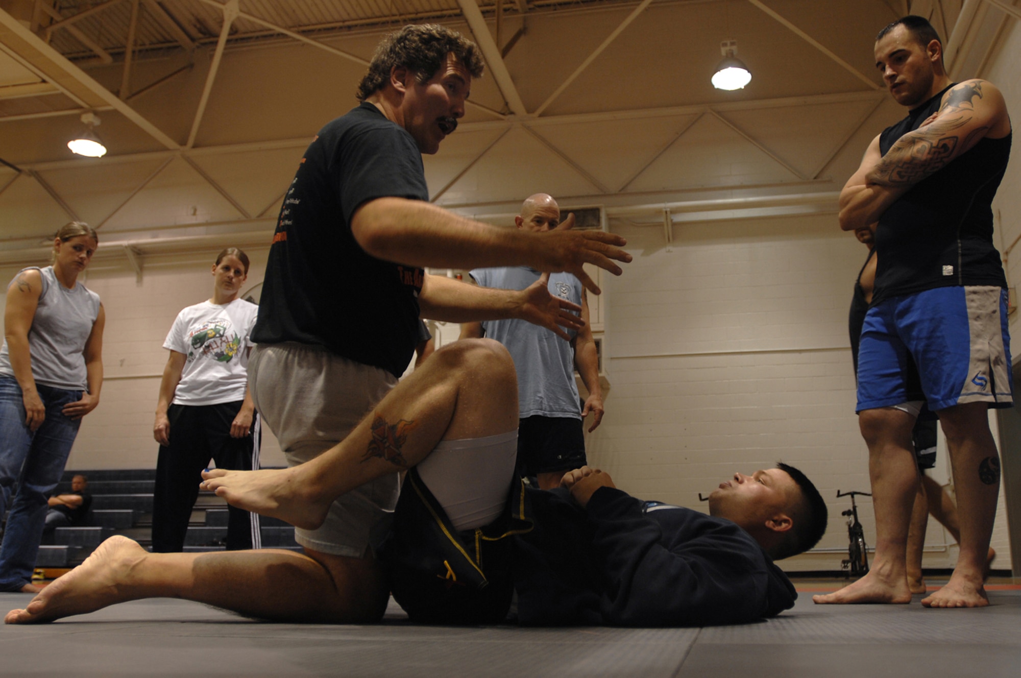 WHITEMAN AIR FORCE BASE, Mo. - Dan Severn, American mixed martial artist and professional wrestler, gives UFC tips and instruction about ultimate fighting to members of Team Whiteman Aug. 20. Mr. Severn performed three different training sessions for Airmen and their families stationed at Whiteman. (U.S. Air Force photo/Senior Airman Kenny Holston)