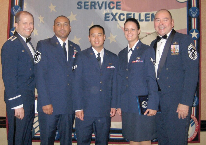 (left to right) Lt. Col. Brian Robins, Master Sergeant Greg Curtis, Senior Airman Michael Iskander, Senior Airman Anna Kifer, and Chief Master Sergeant Augustin Huerta stand together for a photograph following Airman Leadership School graduation August 13th at Travis AFB. Senior Airman Anna Kifer was the third Airman from March ARB to win the Distinguished Graduate Award this year.  She also won an Academic Achievement Award. ALS is a 37-day course of instruction with an emphasis on combat expeditionary leadership and related skills. The curriculum focuses on the whole person, as well as leader/follower skills and core values. It also includes a fair amount of physical education, including a fit to fight regimen. (U.S. Air Force photo)