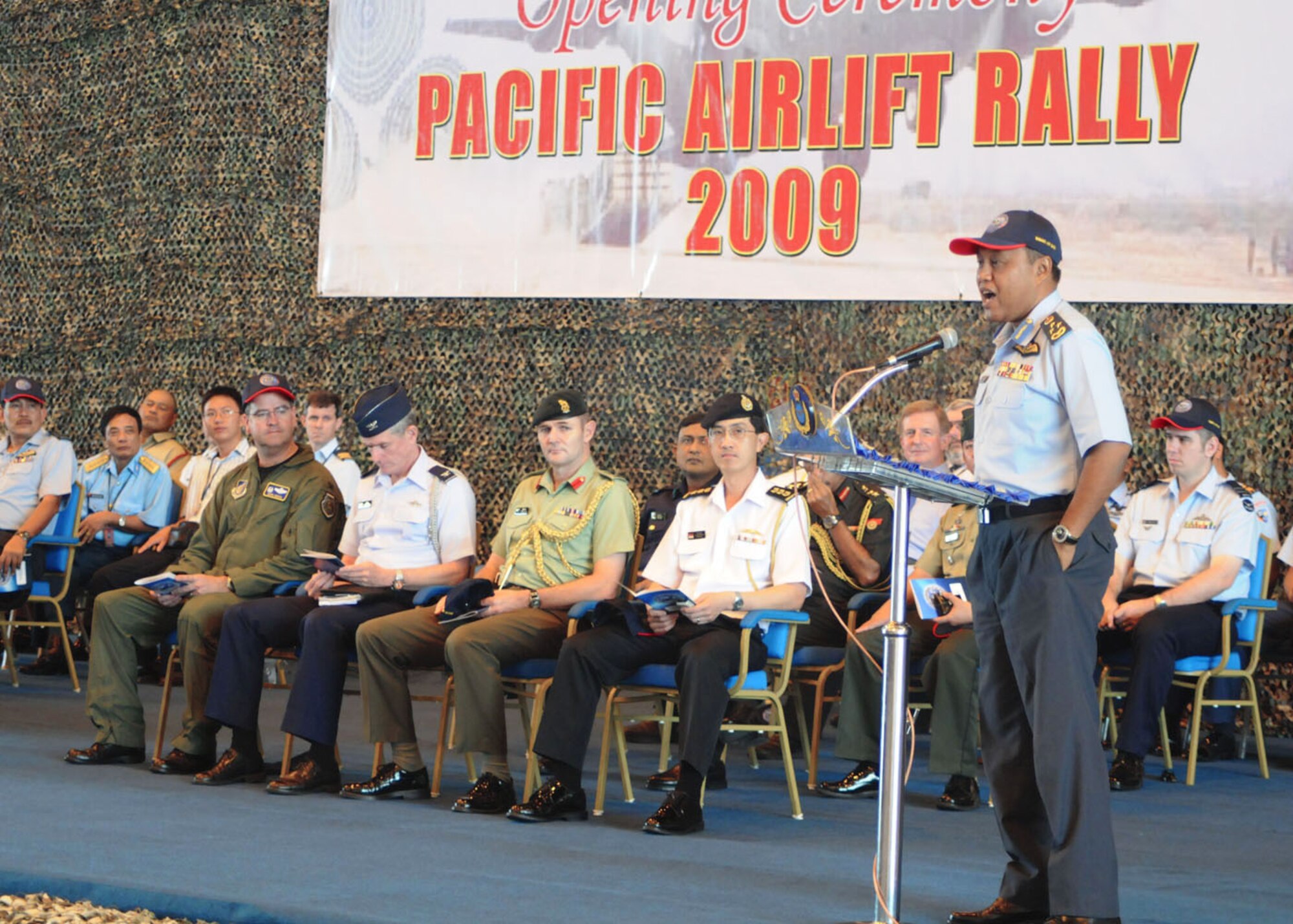 Royal Malaysian Air Force Lt. Gen. Dato Rodzali bin Daud addresses visiting airmen during the opening ceremony of Pacific Airlift Rally 2009 Aug. 18 at Subang Royal Mayaysian Air Force Base, Malaysia. The biennial symposium involves Pacific Rim nations and enhances military airlift interoperability with a focus in humanitarian assistance and disaster relief operations. (U.S. Air Force photo/Staff Sgt. Veronica Pierce) 

