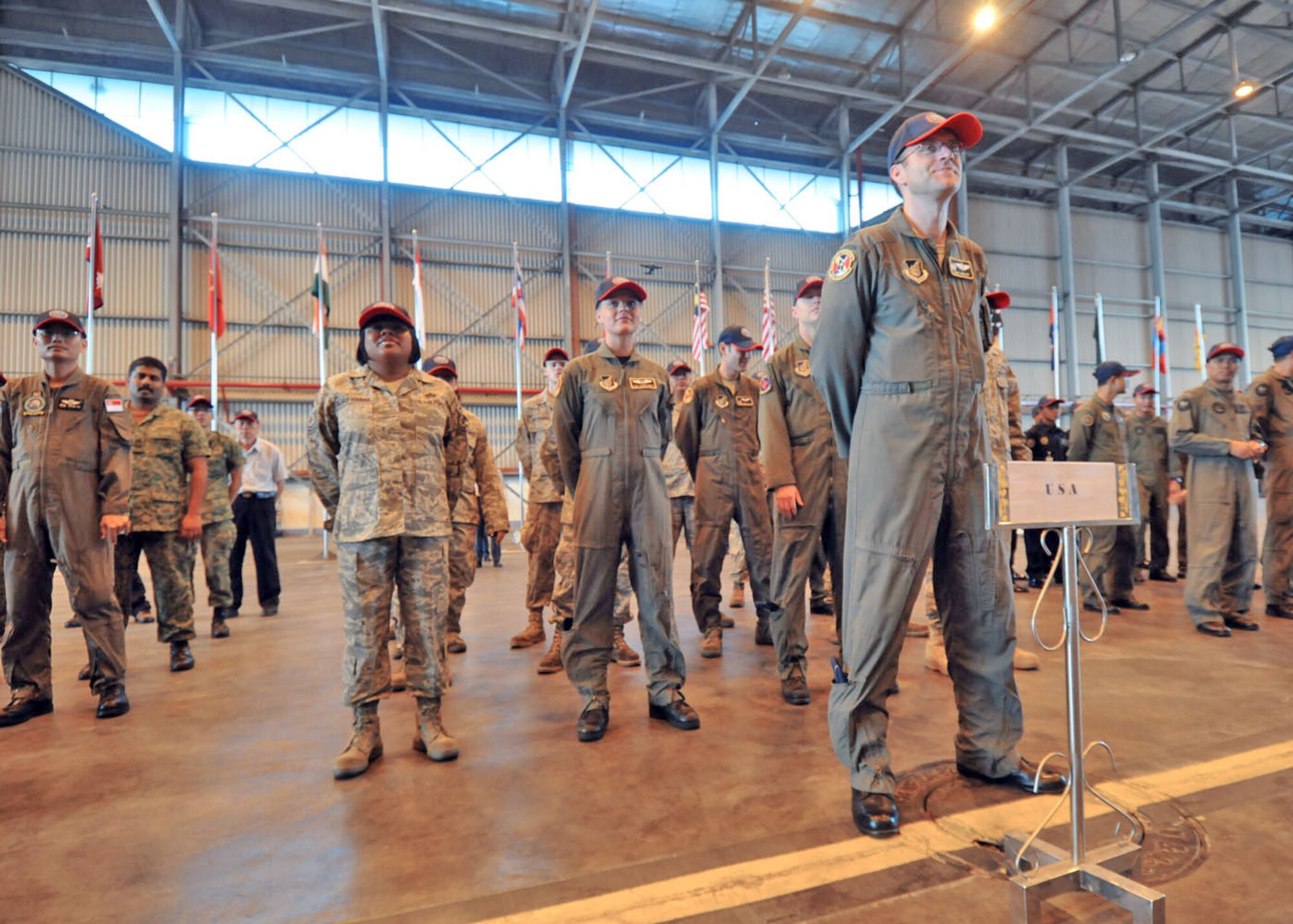 Lt. Col. David Kincaid leads a formation of 36th Airlift Squadron, 374th Operations Support Squadron and 374th Maintenance Squadron Airmen from Yokota Air Base, Japan, during the Pacific Airlift Rally 2009 opening ceremony Aug.18 at Subang Royal Mayaysian Air Force Base, Malaysia. Colonel Kincaid is the 36th AS commander. (U.S. Air Force photo/Staff Sgt. Veronica Pierce) 