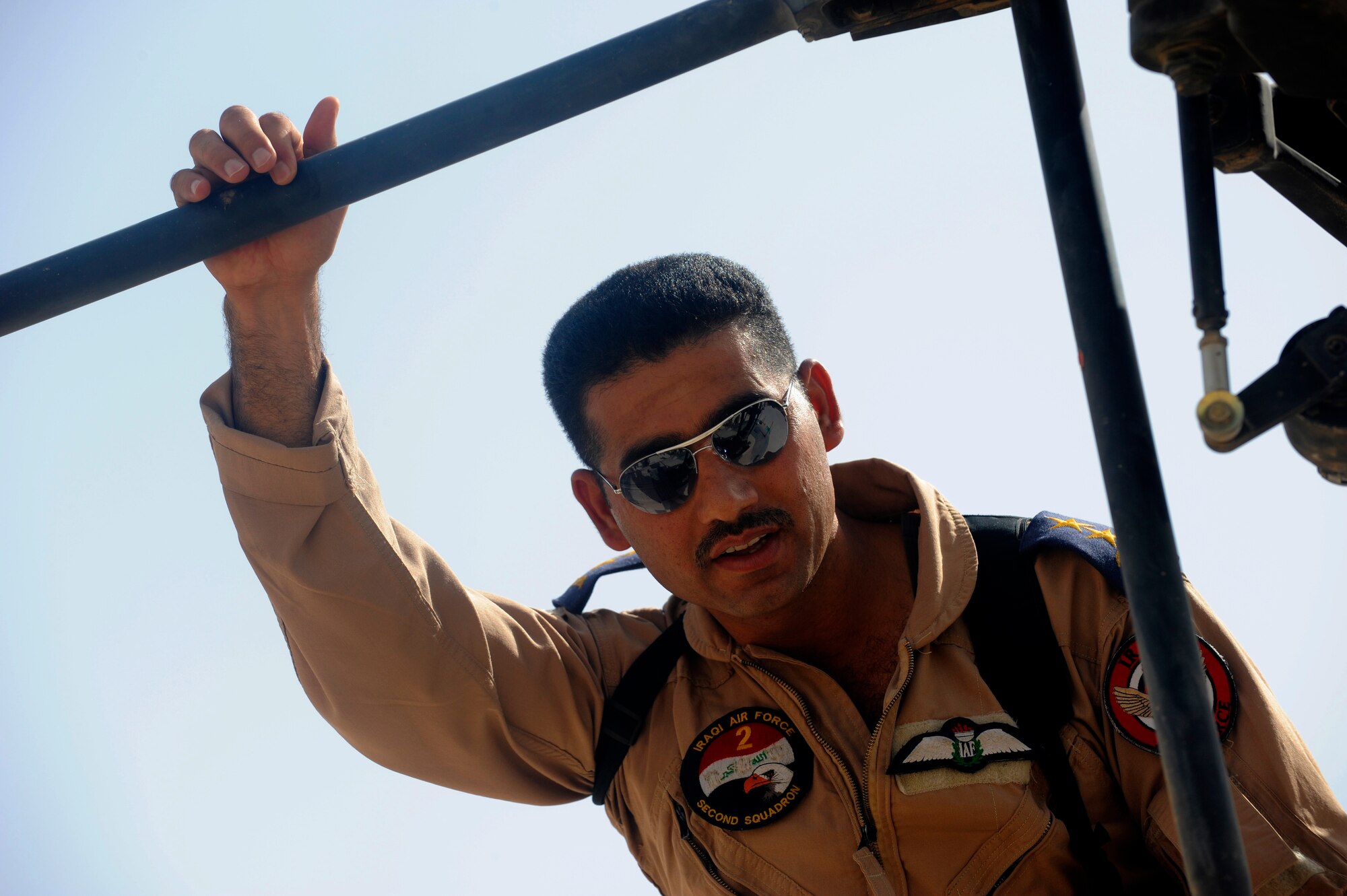 Unites States and Iraqi Air Force Airmen perform a medical transport mission at Taji Air Base, Iraq, July 17, 2009.  (U.S. Air Force photo by Staff Sgt. Michael B. Keller) (Released) 
