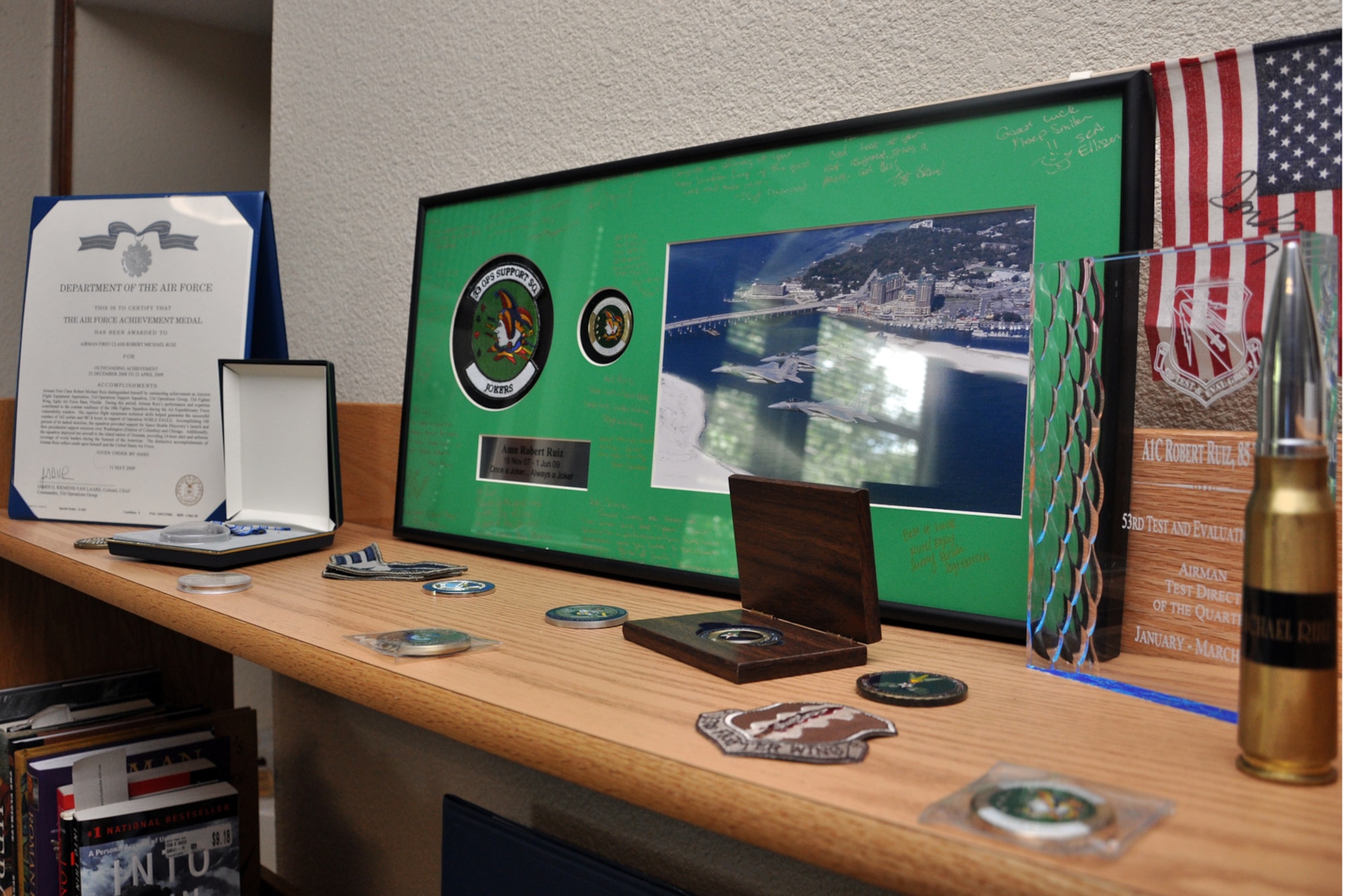 EGLIN AIR FORCE BASE, Fla. – Airman 1st Class Robert Ruiz, 85th Test and Evaluation Squadron, meticulously arranged his awards in his award-winning dorm room. Dorm of the Quarter winners were announced Aug. 18 with Airmen selected from the three wings that participated. The winners were Senior Airman Michael Dwyer, 46th Air Maintenance Squadron, Airman 1st Class Jessica Spence, 96th Logistics Readiness Squadron, and Airman Ruiz. Dorm of the Quarter is a competition designed to recognize Airmen who uphold a hygienic standard of living and make their living quarters truly theirs. (U.S. Air Force photo/ Airman Anthony Jennings)