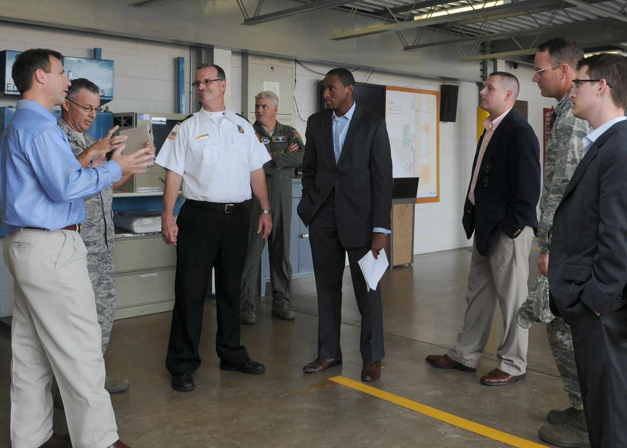 ALTUS AIR FORCE BASE, Okla. -- The staff of U.S. Sen. James M. Inhofe (R-Okla.), a senior member of the Senate Armed Services Committee and Jaryd Bern from the U.S. Representative Dan Boren's (D-Okla.) staff, discuss the future projects needed in the fire station with Col. Noel Zamot, 97th Mission Support Group commander, Paul Pitrat, 97th Civil Engineer Squadron Fire Protection chief, and Col. Jon "Ty" Thomas, 97th Air Mobility Wing commander. The staffers toured the base with Colonel Thomas and received an update on future and on-going projects as well as visited key facilities and areas vital to the mission at Altus AFB. (U.S. Air Force photo/ Senior Airman Leandra D. Hernandez)