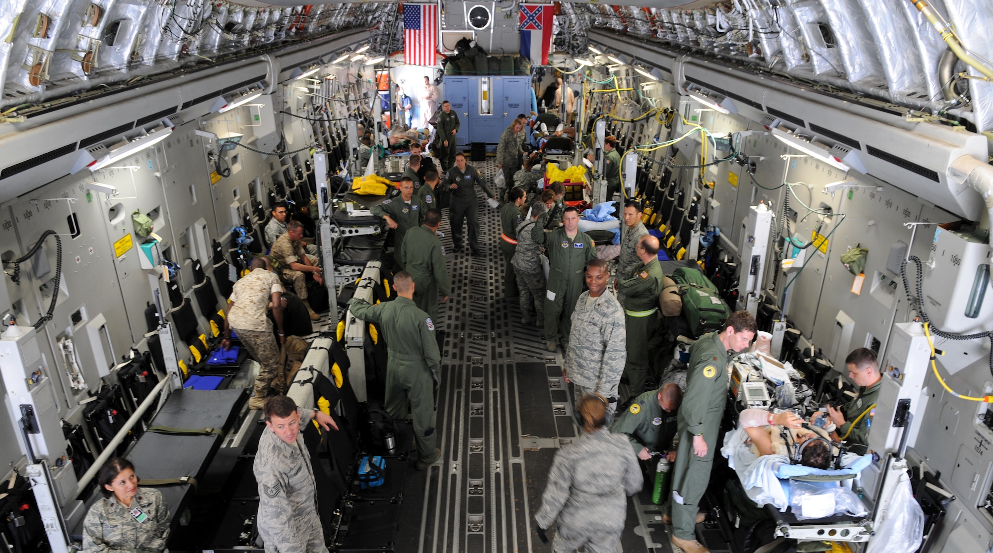 U.S. Military Forces from the 86th Contingency Aeromedical Staging Facility and 86th Aeromedical Evacuation Squadron prepare a C-17 Globemaster III to load wounded warriors on Ramstein Air Base, Germany, Aug. 18, 2009. From Ramstein, the wounded warriors get loaded on a C-17 Globemaster III to transport them to Walter Reed Army Medical Facility, Washington, D.C. for further medical treatment. (U.S. Air Force photo by Airman 1st Class Grovert Fuentes-Contreras)