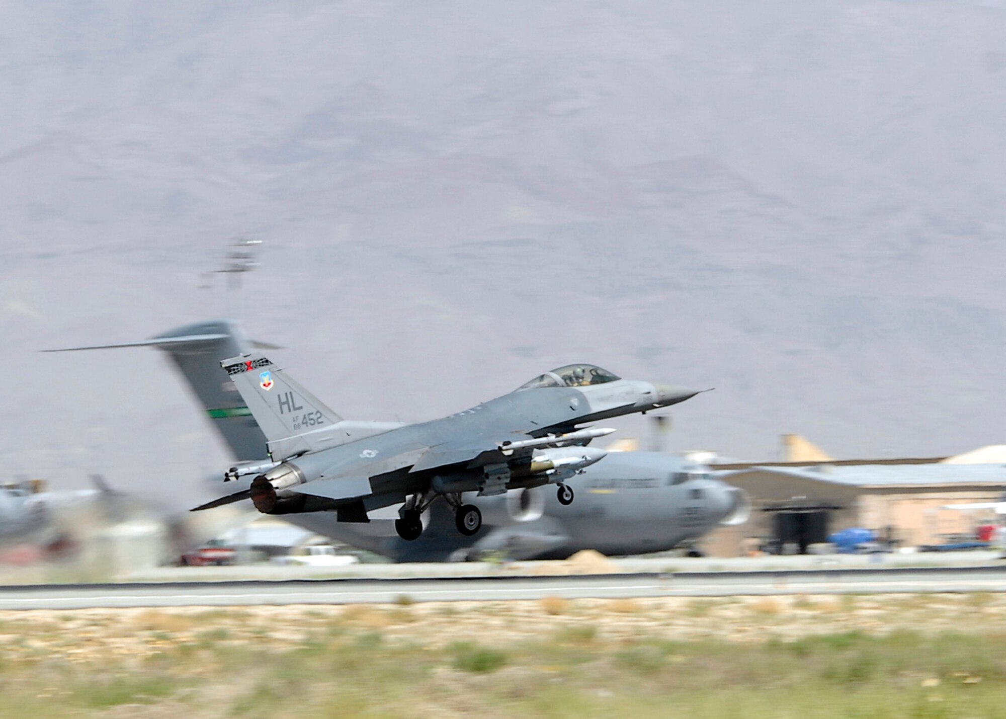 BAGRAM AIRFIELD, Afghanistan - An F-16, from the 421st Expeditionary Fighter Squadron, launches to assure safety and security to the Afghan people on their election day.  F-16 Fighting Falcon's launch in support of Coalition forces around the clock. (U.S. Air Force photo/Senior Airman Felicia Juenke)