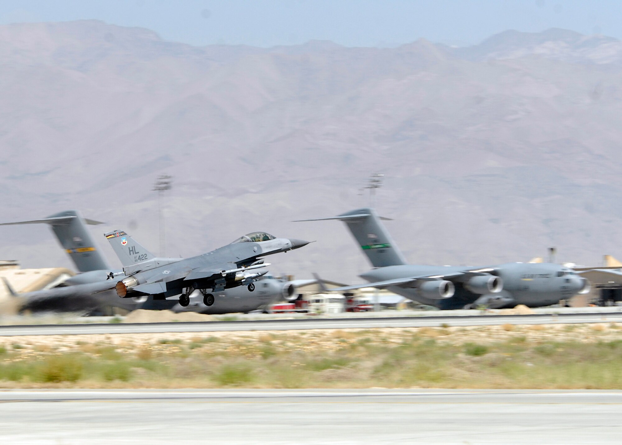 BAGRAM AIRFIELD, Afghanistan - An F-16, from the 421st Expeditionary Fighter Squadron, launches to assure safety and security to the Afghan people on their election day.  F-16 Fighting Falcon's launch in support of Coalition forces around the clock. (U.S. Air Force photo/Senior Airman Felicia Juenke)