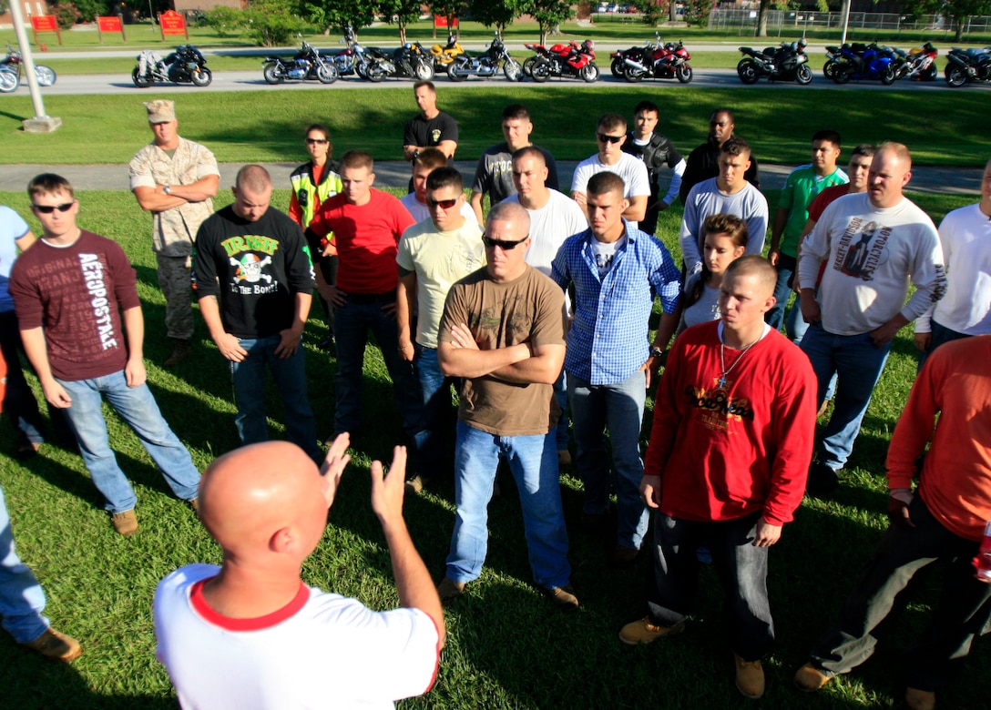 Staff Sgt. Brent M. Sharp, 2nd Marine Logistics Group motorcycle safety officer, gives riders an orientation and safety brief before they embark on a motorcycle safety ride from Camp Lejeune to Greenville, N.C., Aug. 21. This was the second ride organized by the MLG in the last year, in an effort to promote safe riding and the proper use of safety equipment amongst members of the Marine Corps/Navy team.