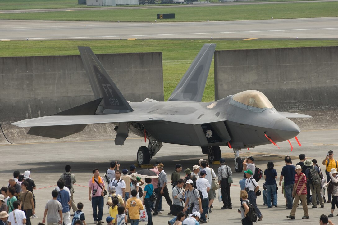 YOKOTA AIR BASE, Japan -- More than 80,000 people attended the first day of the two-day Yokota Air Base Japanese-American Friendship Festival Aug. 22. The main attraction was two F-22 Raptors from the 94th Fighter Squadron "Hat in the Ring Gang" at Langley Air Force Base, Va. In addition to static displays and live music, the festival offered a variety of American and Japanese food items. The festival is designed to bolster the bi-lateral relationship shared by the United States and Japan.(U.S. Air Force photo/Osakabe Yasuo)