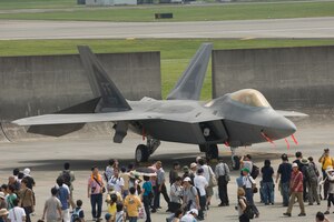YOKOTA AIR BASE, Japan -- More than 80,000 people attended the first day of the two-day Yokota Air Base Japanese-American Friendship Festival Aug. 22. The main attraction was two F-22 Raptors from the 94th Fighter Squadron "Hat in the Ring Gang" at Langley Air Force Base, Va. In addition to static displays and live music, the festival offered a variety of American and Japanese food items. The festival is designed to bolster the bi-lateral relationship shared by the United States and Japan.(U.S. Air Force photo/Osakabe Yasuo)