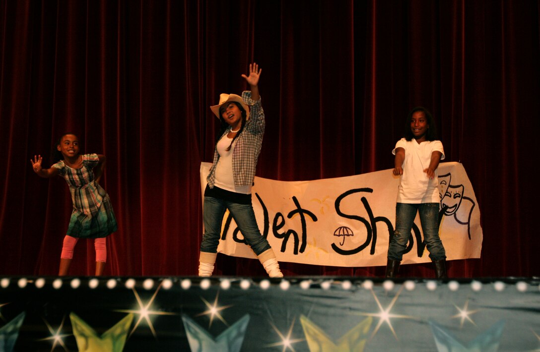 Contestants from the Santa Margarita School Aged Children youth program, performed during the Children, Youth and Teen Program talent show held at Camp Pendleton's base theater, Aug. 22. This group, who called themselves the 'Cowgirls,' won second place in the dance category.
