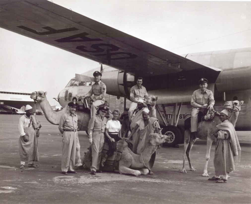 Former Commander Colonel Howard and members of The USAF Band on a tour to Tripoli, Libya.  A camel was presented as a gift to the Band but due to customs restrictions, had to be left behind.  The saddle is occasionally on display at the National Museum of the United States Air Force. (Air Force Photo)