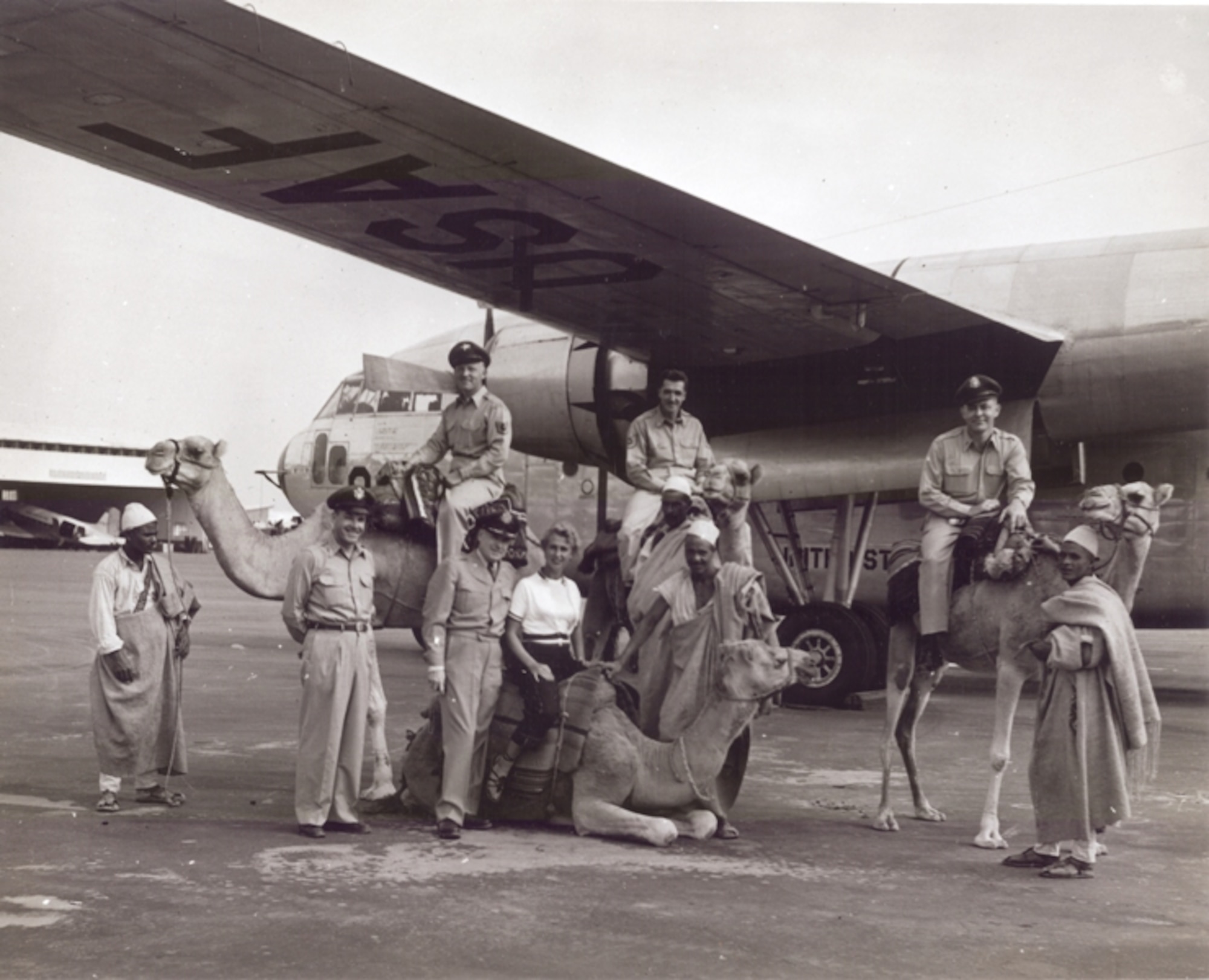 Former Commander Colonel Howard and members of The USAF Band on a tour to Tripoli, Libya.  A camel was presented as a gift to the Band but due to customs restrictions, had to be left behind.  The saddle is occasionally on display at the National Museum of the United States Air Force. (Air Force Photo)