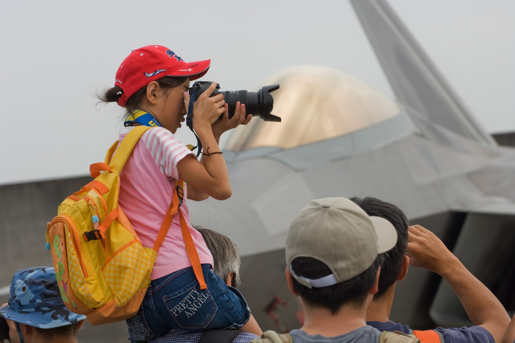 YOKOTA AIR BASE, Japan -- More than 170,000 people attended the two-day 2009 Yokota Air Base Japanese-American Friendship Festival Aug. 22-23. The main attraction was two F-22 Raptors from the 94th Fighter Squadron "Hat in the Ring Gang" at Langley Air Force Base, Va. In addition to static displays and live music, the festival offered a variety of American and Japanese food items. The festival is designed to bolster the bi-lateral relationship shared by the United States and Japan. (U.S. Air Force photo/Osakabe Yasuo)
