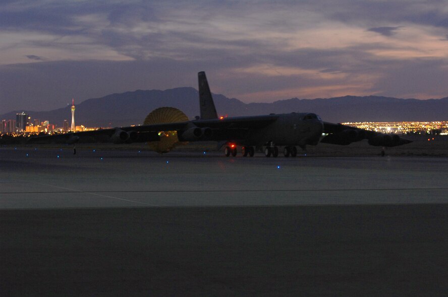 NELLIS AIR FORCE BASE, Nev. --  A B-52 assigned to the 20th Bomb Squadron, Barksdale Air Force Base, La. arrives at Nellis AFB, Nev., Aug 21 to participate in Red Flag 09-5, an intense two-week combat scenario exercise.  Red Flag is conducted on the 15,000-square-mile Nevada Test and Training Range, north of Las Vegas. The exercise is one of a series of advanced training programs administered by the U.S. Air Force Warfare Center and Nellis, through the 414th Combat Training Squadron. (U.S. Air Force photo by Staff Sgt. Sarah E. Stegman)(RELEASED)