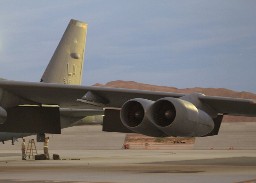 NELLIS AIR FORCE BASE, Nev. --  Maintainers from the 2d Maintenance Squadron, unload gear from a B-52 assigned to the 20th Bomb Squadron, Barksdale Air Force Base, La. The B-52s arrived at Nellis AFB, Nev., Aug 21 to participate in Red Flag 09-5, an intense two-week combat scenario exercise.  Red Flag is conducted on the 15,000-square-mile Nevada Test and Training Range, north of Las Vegas. The exercise is one of a series of advanced training programs administered by the U.S. Air Force Warfare Center and Nellis, through the 414th Combat Training Squadron. (U.S. Air Force photo by Staff Sgt. Sarah E. Stegman)(RELEASED)