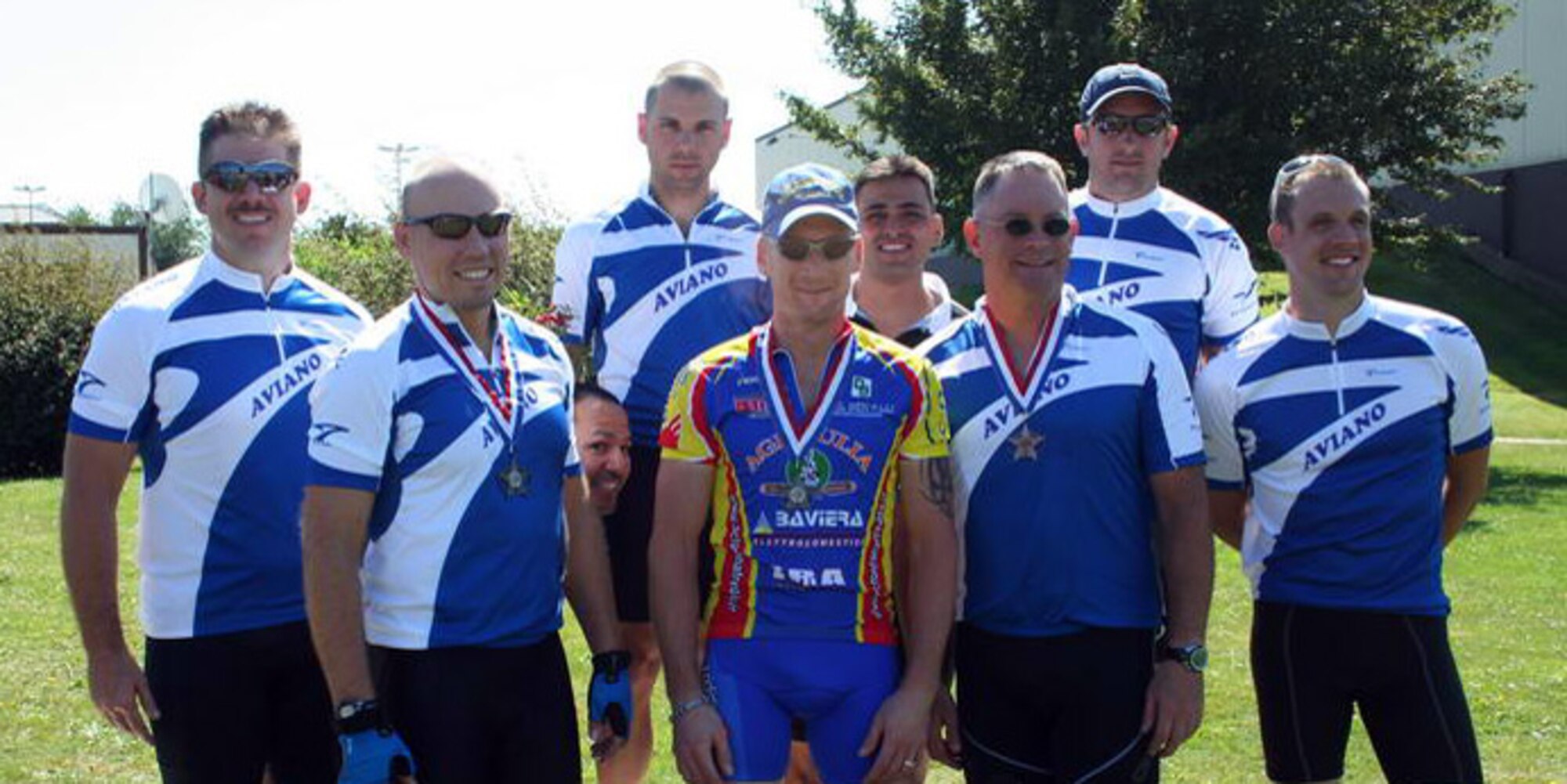 Cyclists from Aviano Air Base, Italy, pose for a team photo at the Eifel Classic 2009 held at Spangdahlem Air Base, Germany, Aug. 15.  Four of eight riders from Aviano finished in the top 10 out of 33 cyclists.  The race is part of the 2009 U.S. Forces Europe Road Cycling Series.  The 50-kilometer course for men and 30K course for women took riders around the the perimeter road of Spangdahlem AB.  (Courtesy photo)