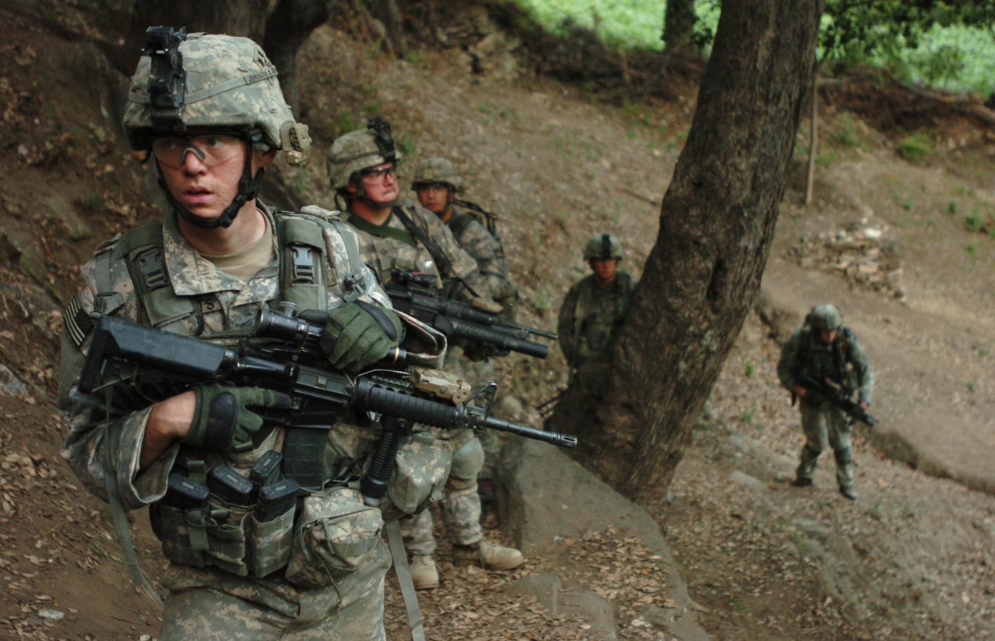 KORENGAL VALLEY, Afghanistan - U.S. Army Sgt. Matthew Roberts, a native of Huston, Texas, scans the hills surrounding the volatile Korengal Valley in Afghanistan’s Kunar province, during an early morning patrol, Aug. 13. Roberts, and fellow members of Baker Company, 2nd Battalion, 12th Infantry Regiment, 4th Infantry Division, have endured some of the toughest fighting in Afghanistan since arriving to the valley in June. (U.S. Army photo/Sgt. Matthew Moeller)