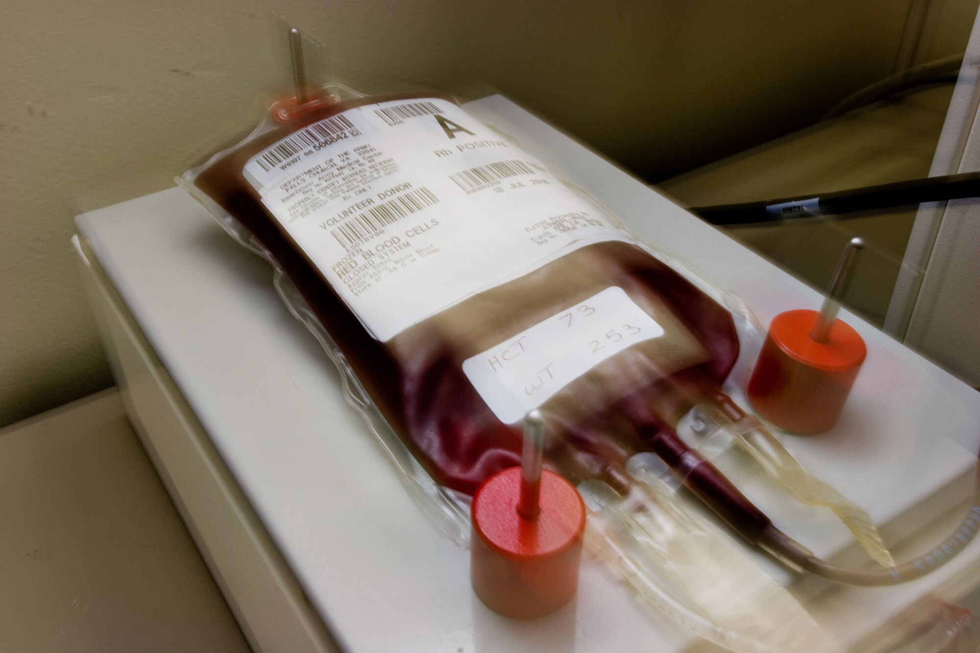 YOKOTA AIR BASE, Japan -- Yokota and Misawa Airmen recently received Blood Deglycerolization Team training provided by members of the Armed Services Whole Blood Processing Laboratory-West at Travis Air Force Base, Calif. The Haemonetics ACP215 system is designed to both glycerolize and deglycerolize red blood cells. Glycerol acts as a preservative to allow blood to be frozen for long periods of time. The glycerol must be removed before the blood can be used. After glycerolized
red cells have been thawed, the plastic freezing bag is secured to a platform on the ACP215 by magnetic mounting posts. The ACP system dilutes the blood with sodium, utilizing the shaking platform to ensure adequate mixing and thus revitalize the red cells. (U.S. Air Force photo/Osakabe Yasuo)
