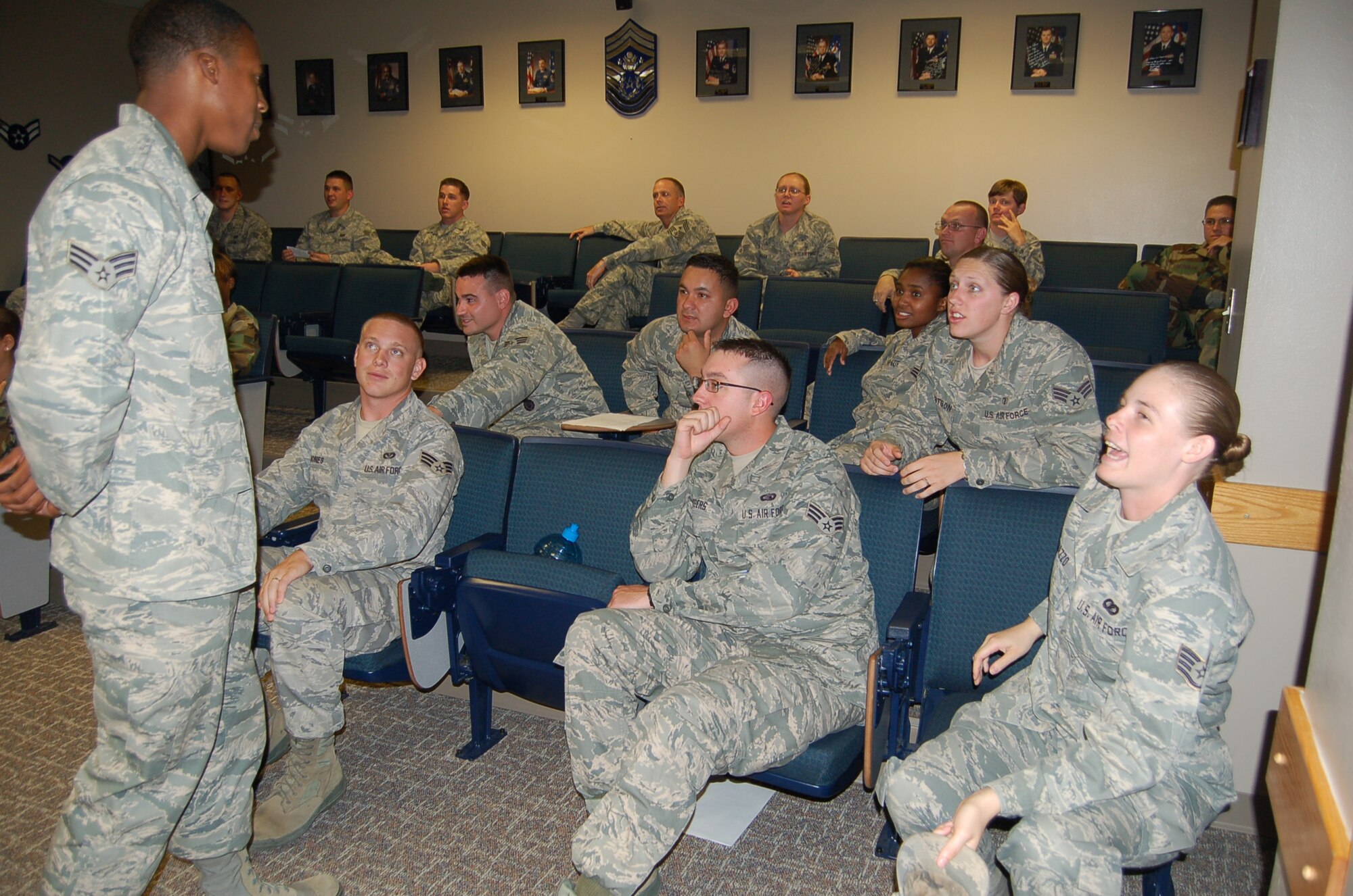 Peterson Airman Leadership School Eagle Flight engages in team work during the new Jeopardy learning tool unveiled at Peterson’s ALS Aug. 11. The learning tool incorporated questions based on basic training and dress appearance guidelines. (Air Force photo by Thea Skinner)