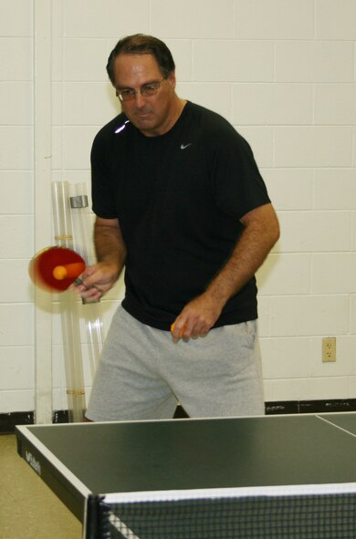 Dennis Rackard, the second ranked table tennis player in the area, returns a volley during a table-tennis game Aug. 22 at the Hedrick Recreation Center in Fort Walton Beach, Fla.  Mr. Rackard created the Fort Walton Beach Table Tennis Club 10 years ago at the NCO club at Eglin.  It has branched out and now has spproximately 20 members who play twice weekly.  U.S. Air Force photo/2nd Lt. Andrew Caulk.)

