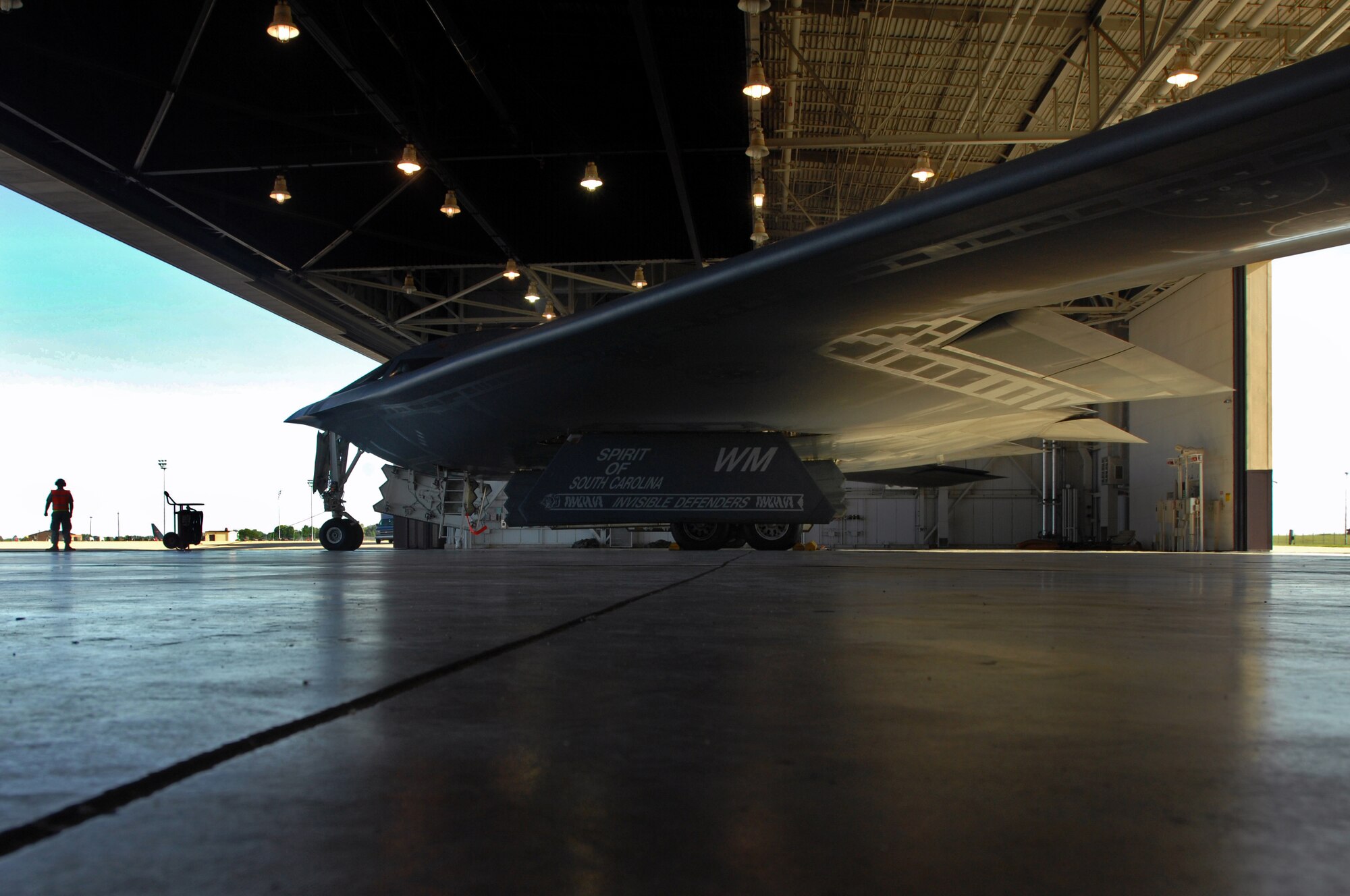 WHITEMAN AIR FORCE BASE, Mo. – A B-2 Spirit sits in a hanger while being prepped for takeoff by crew chiefs with the 509th Aircraft Maintenance Squadron, Aug. 22, 2009. Twenty B-2 Bombers are assigned to the 509th Bomb Wing. The B-2 brings massive firepower to bear, in a short time, anywhere on the globe through previously impenetrable defenses. (U.S. Air Force photo/Senior Airman Kenny Holston)
